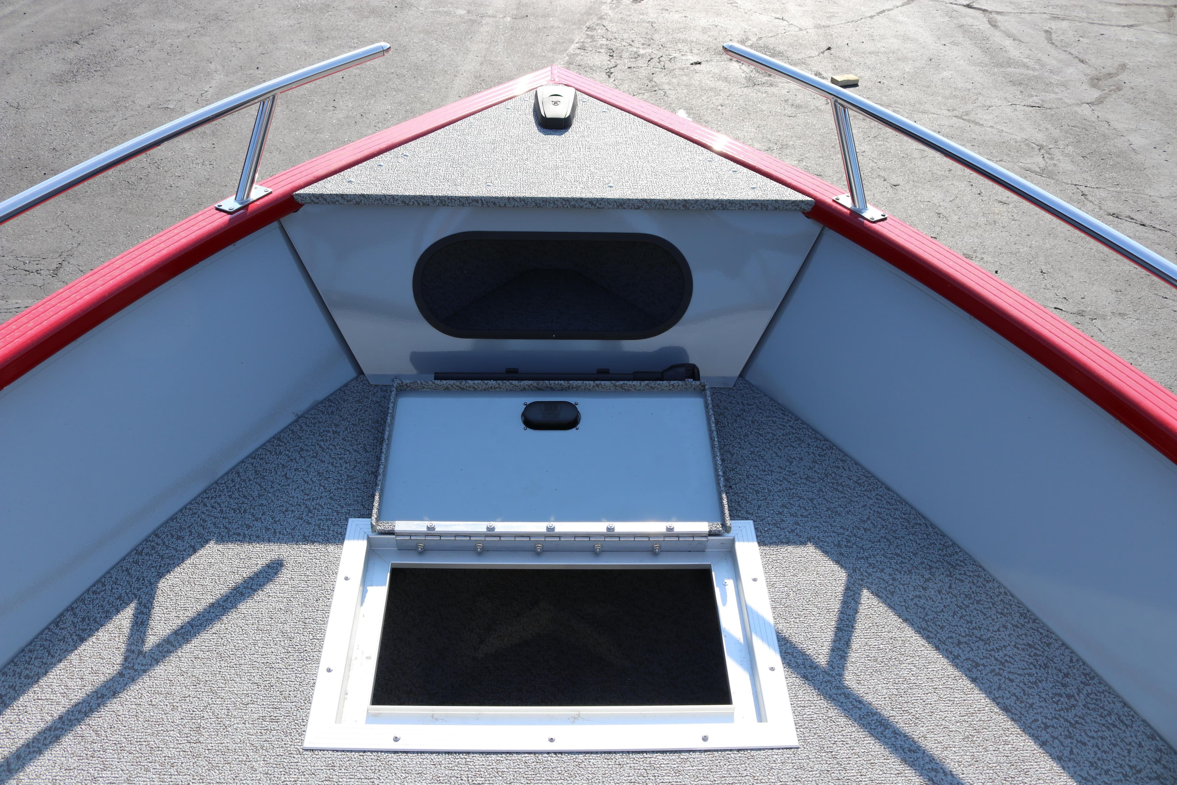 Bow view of 2026 Smoker Caft Pro Tracer 162 boat with storage compartment.