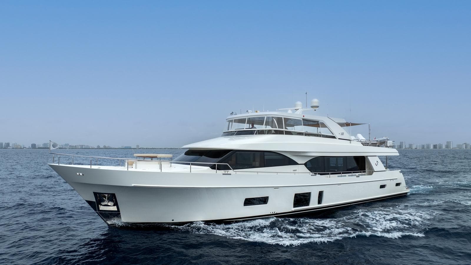 Luxury Ocean Alexander 100 MY yacht cruising on open water, 2020 model.