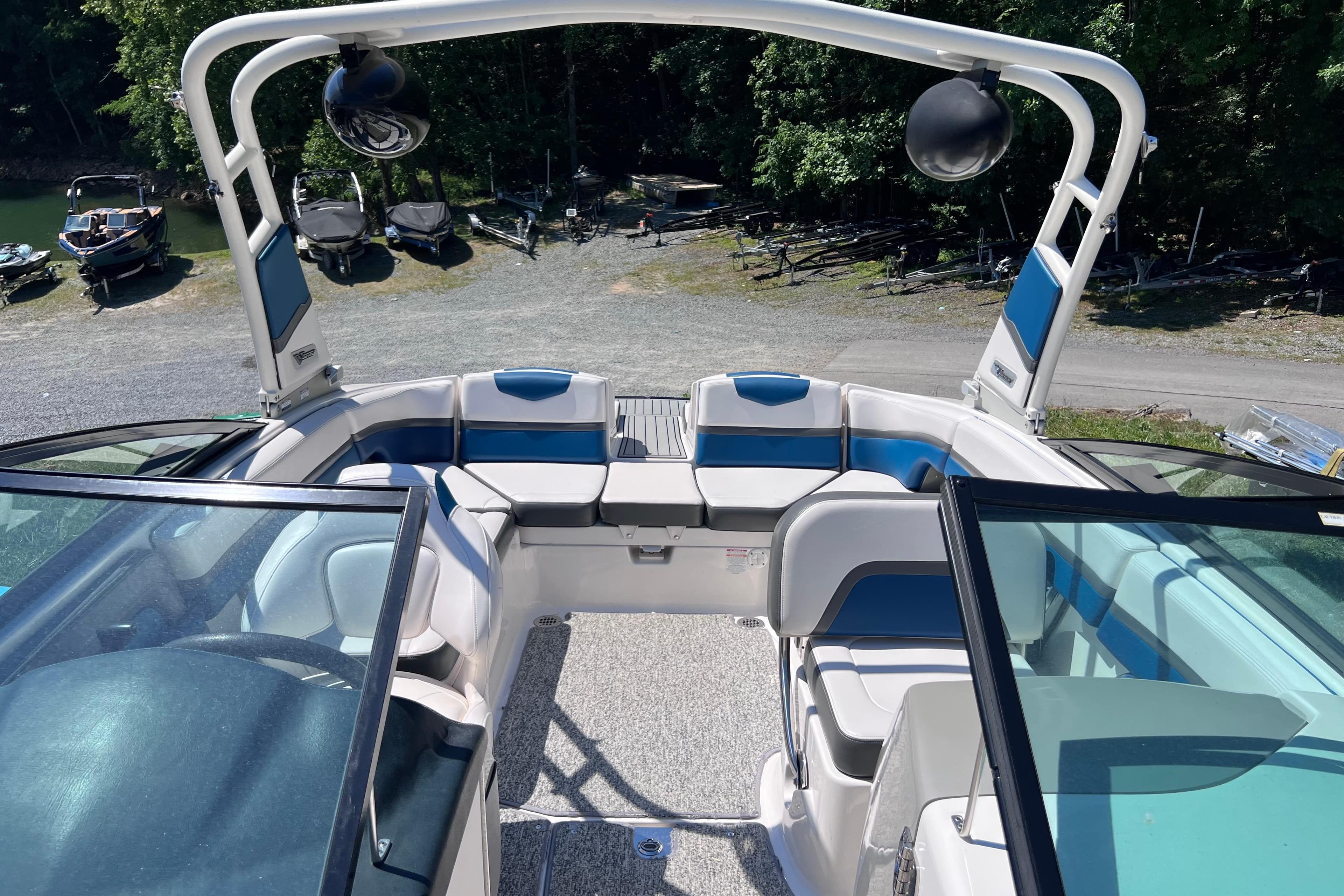 2016 Chaparral Vortex 243 VRX boat interior with blue and white seating.