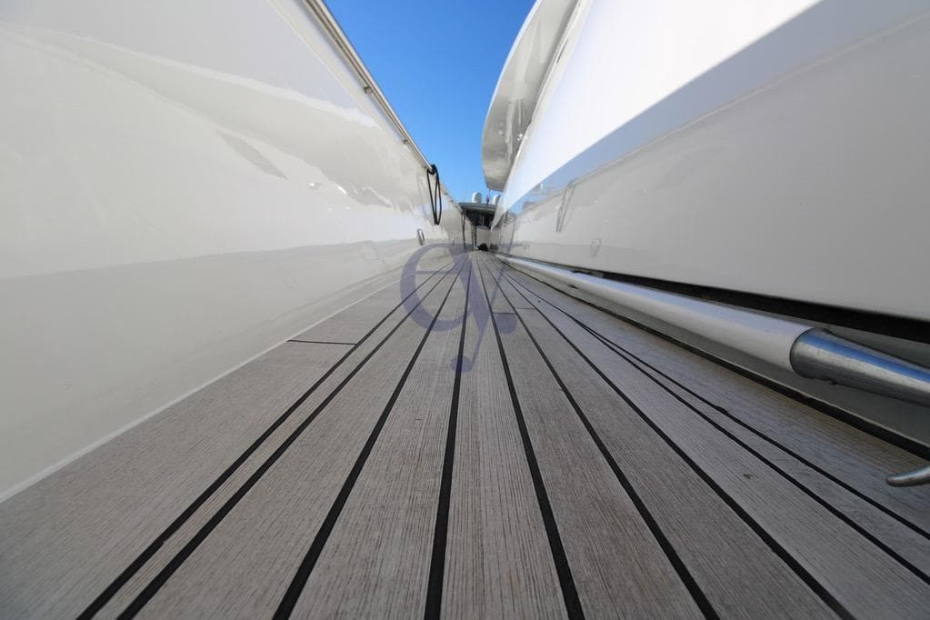 Side deck view of a 1996 Canados 23 yacht, showcasing sleek design and craftsmanship.