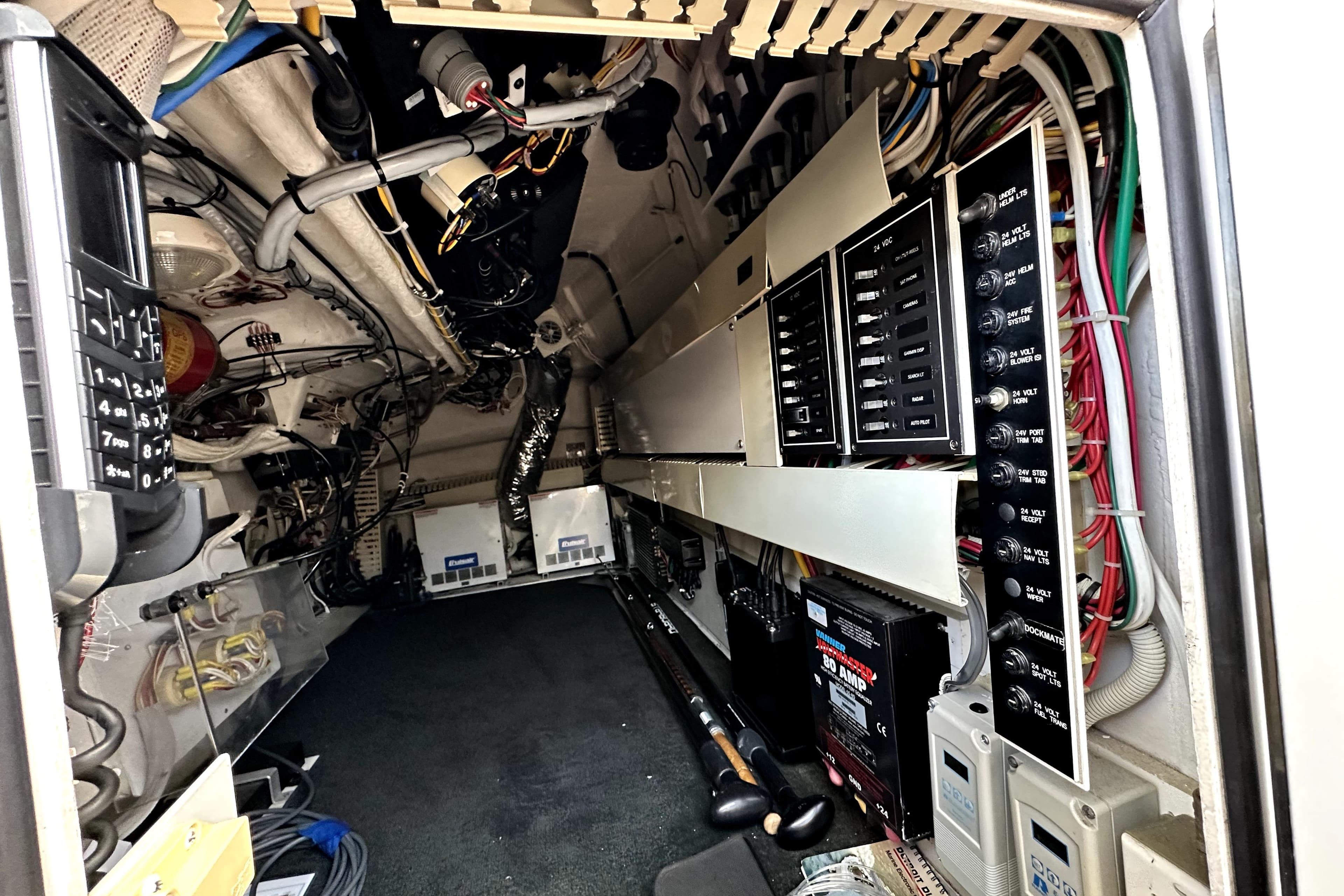 Electrical panel and wiring inside a 2003 Viking 61 Convertible yacht.