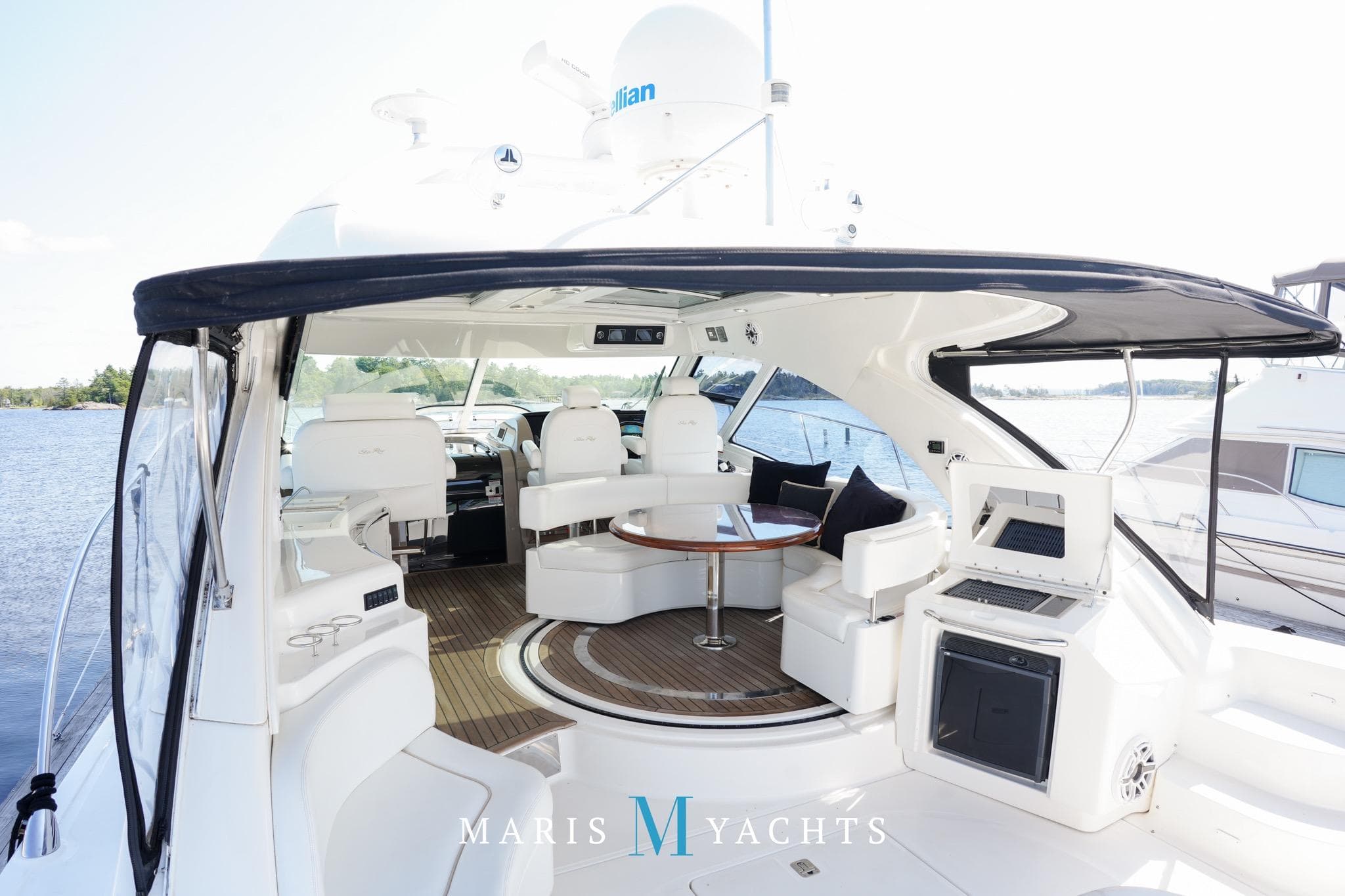 Luxurious 2009 Sea Ray 55 Sundancer yacht interior with elegant seating and modern amenities.