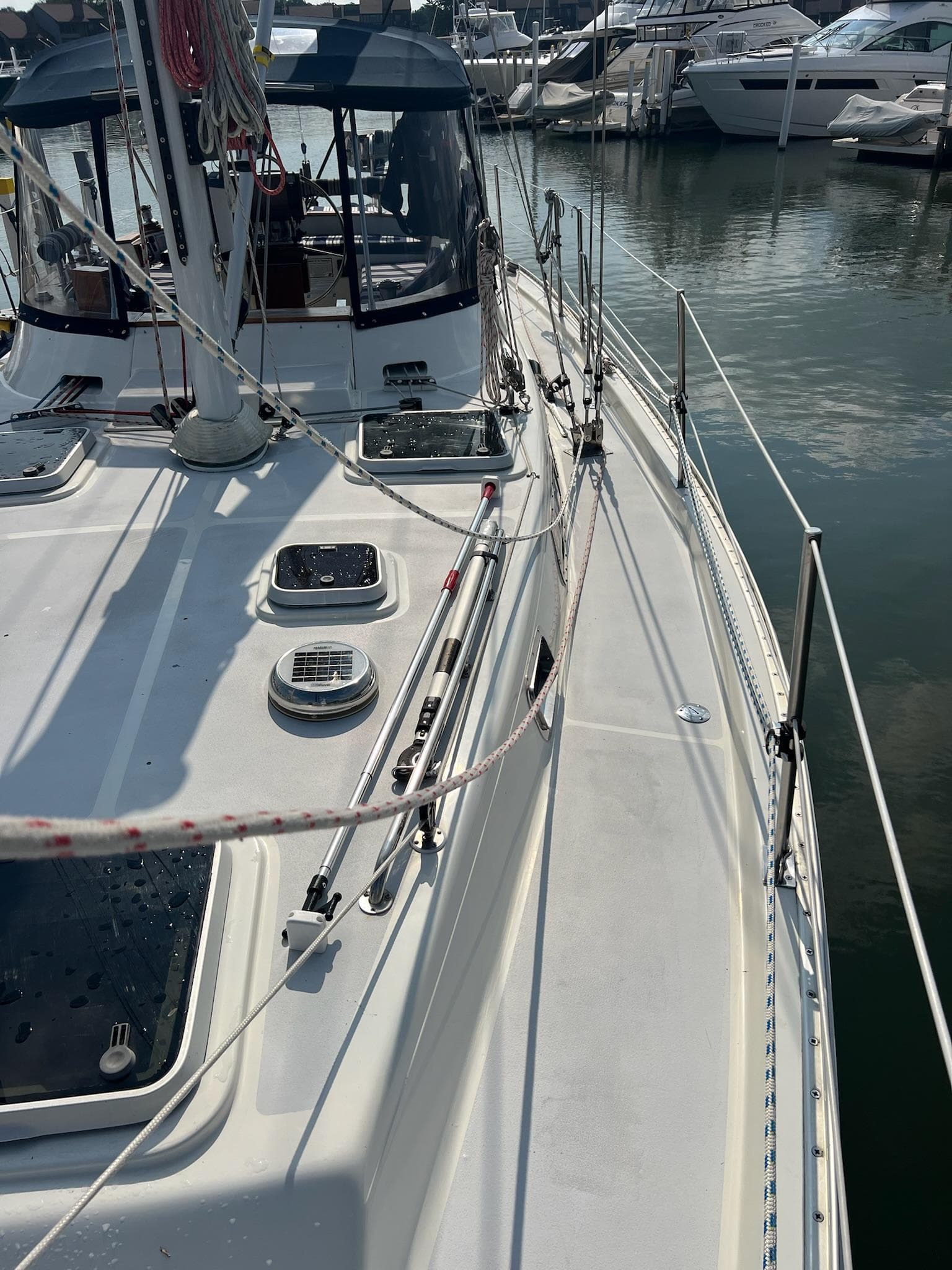 1992 Endeavour 45 sailboat deck with rigging, docked at marina.