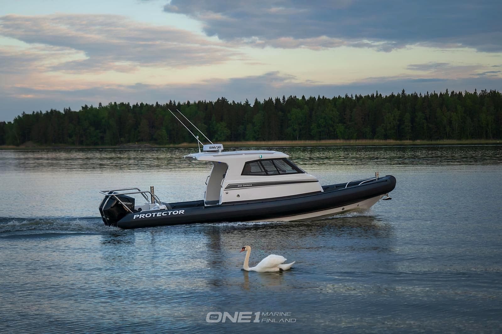 2021 Protector 310 Targa boat cruising on a serene lake with a swan nearby.