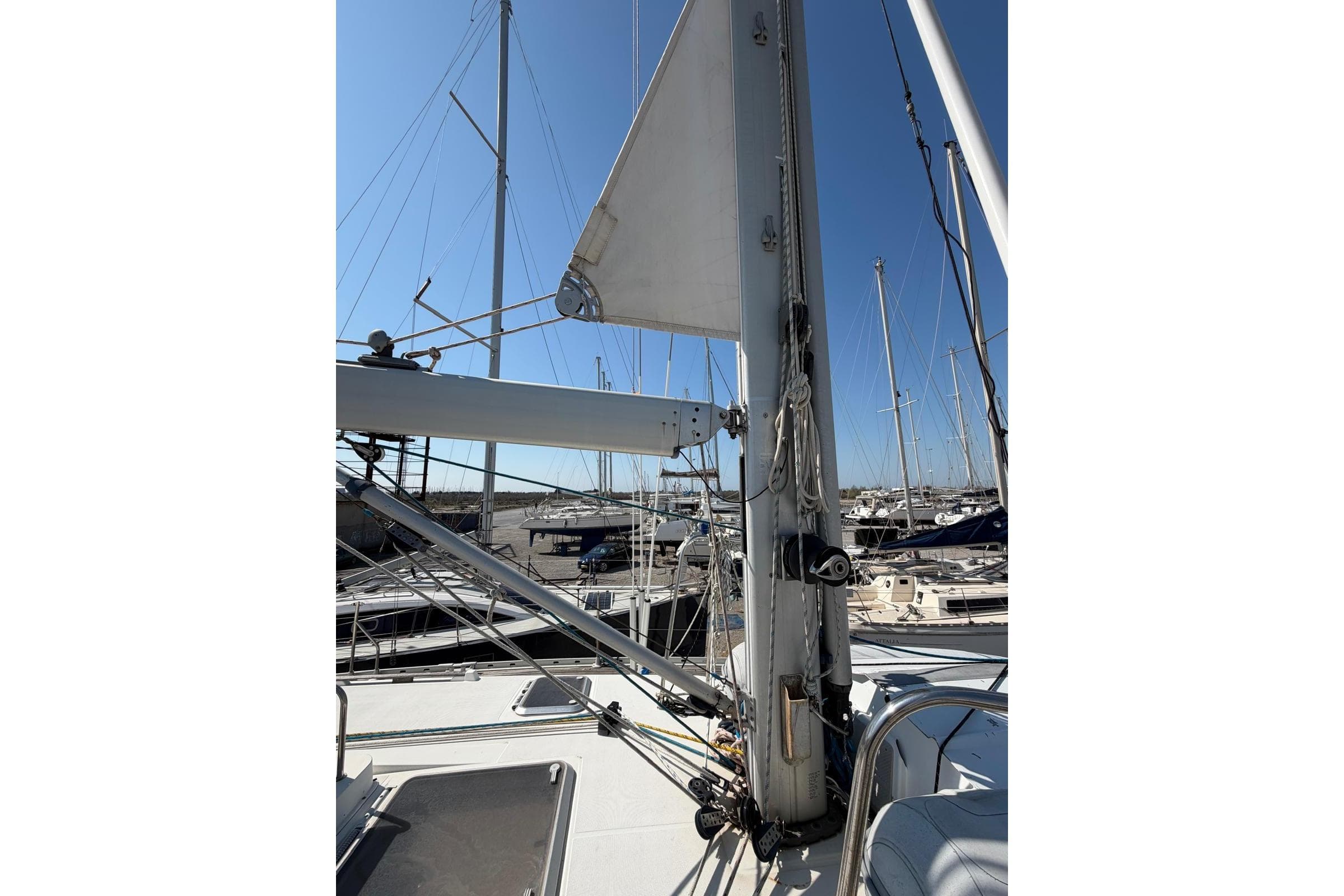 Jeanneau Sun Odyssey 52.2 sailboat mast and rigging in marina, 2000 model.