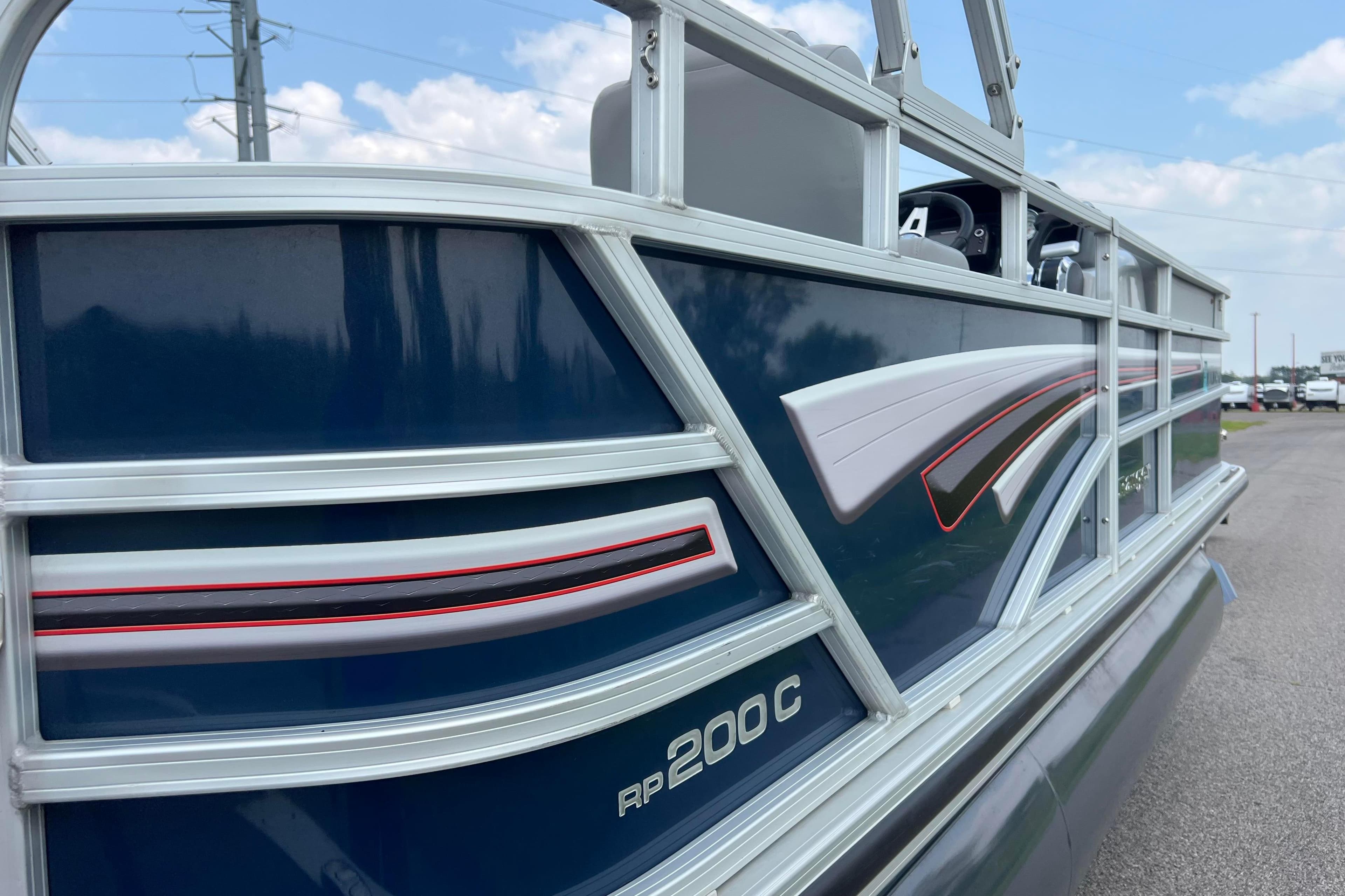 2019 Ranger Reata 200C pontoon boat with sleek blue and silver design.