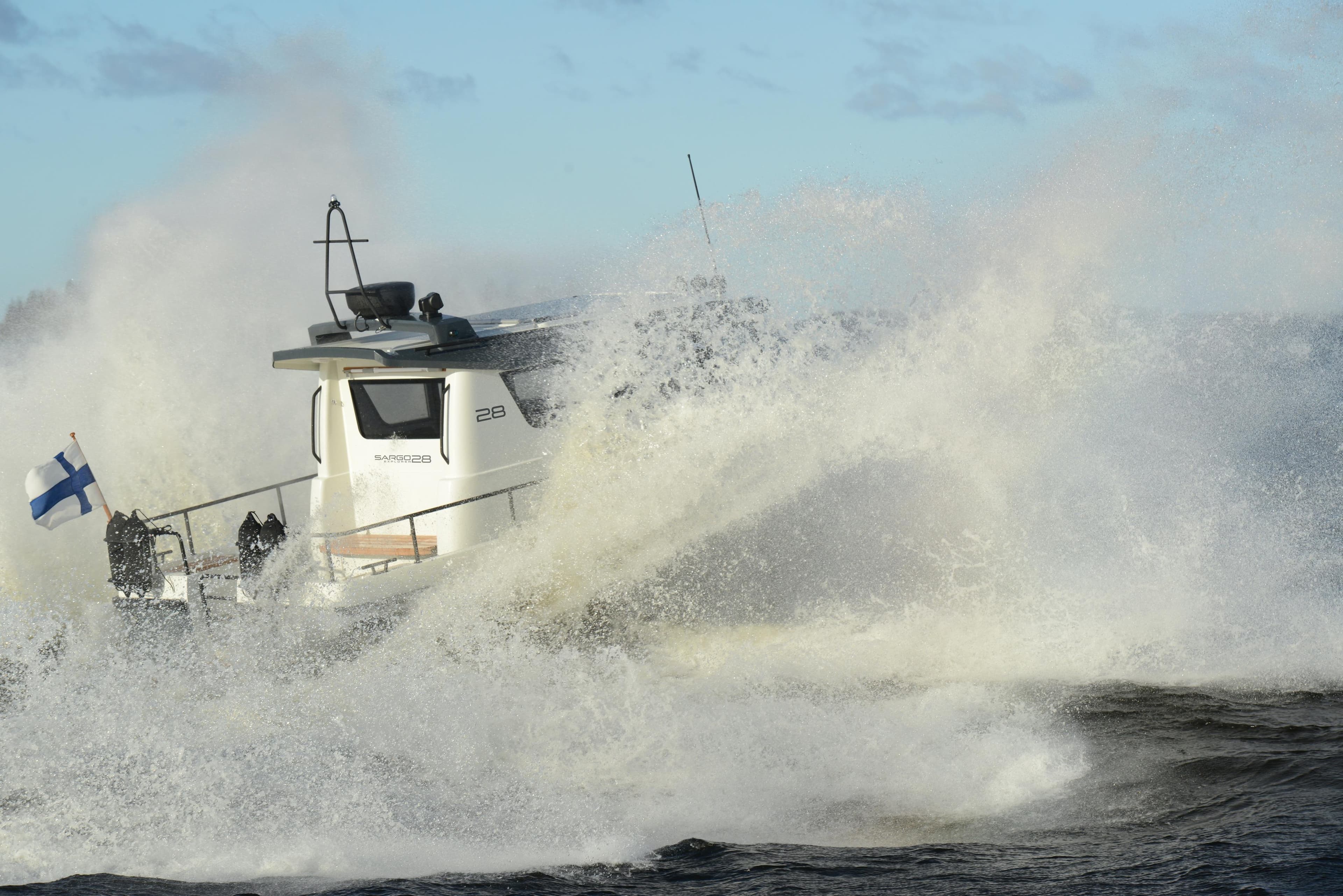 Sargo 28 boat navigating rough waters, 2024 model.