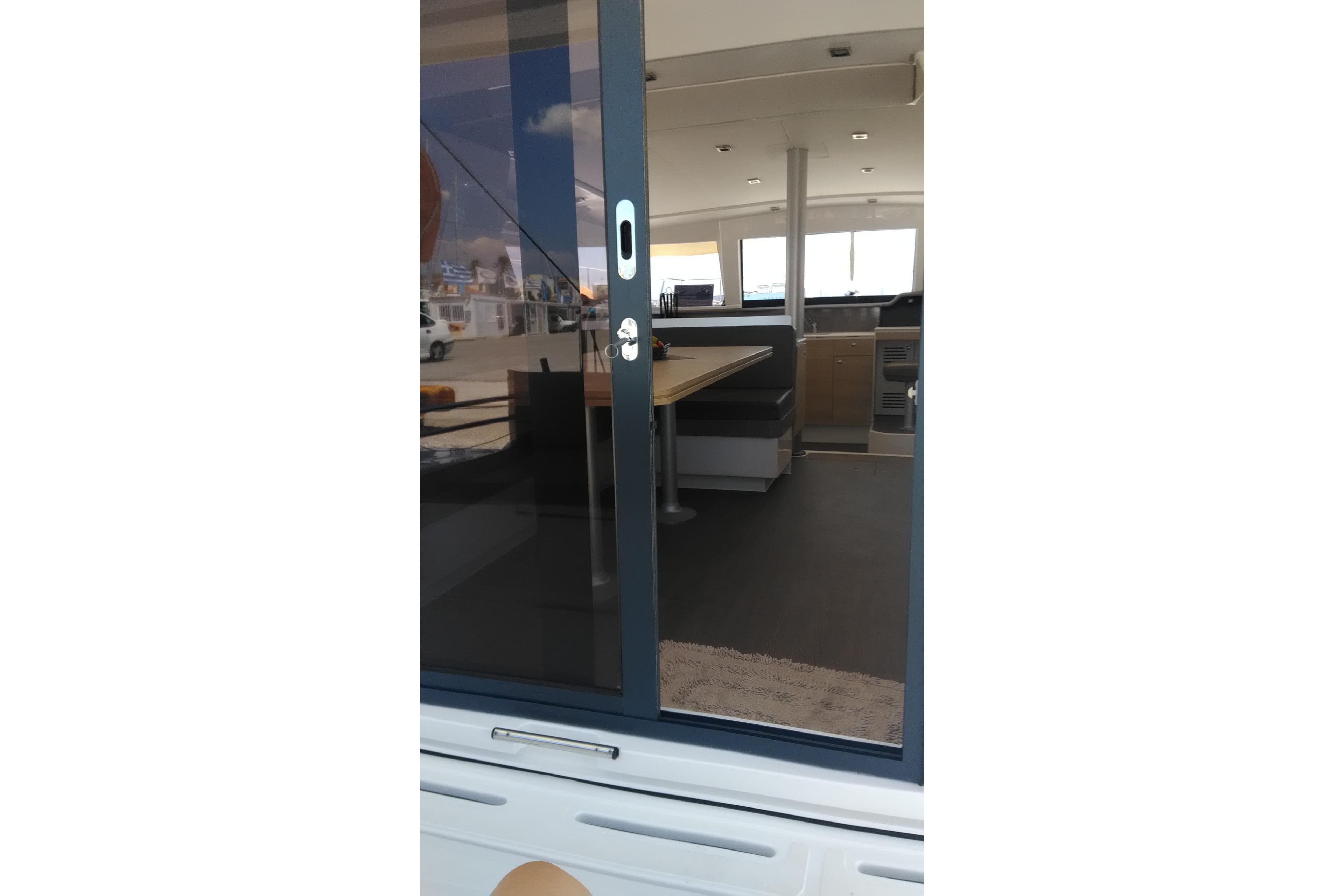Interior view of 2018 Bali 4.1 catamaran through sliding glass door.