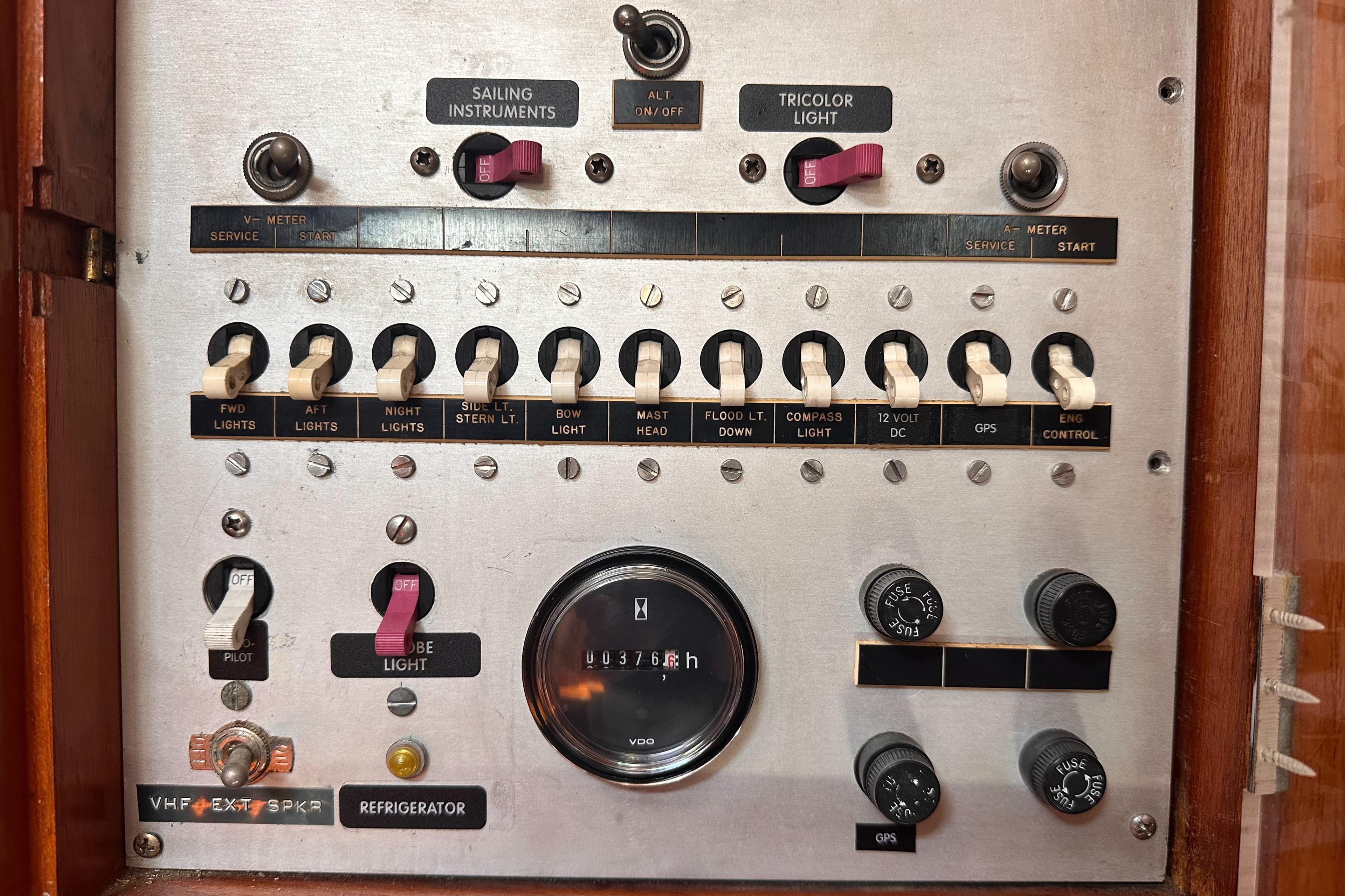 Control panel of a 1980 Nautor Swan 371 sailboat with various switches and gauges.