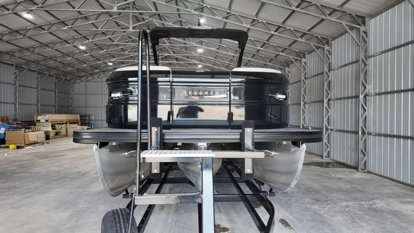 2024 Barletta LEGGERA R26UCA pontoon boat in storage facility.