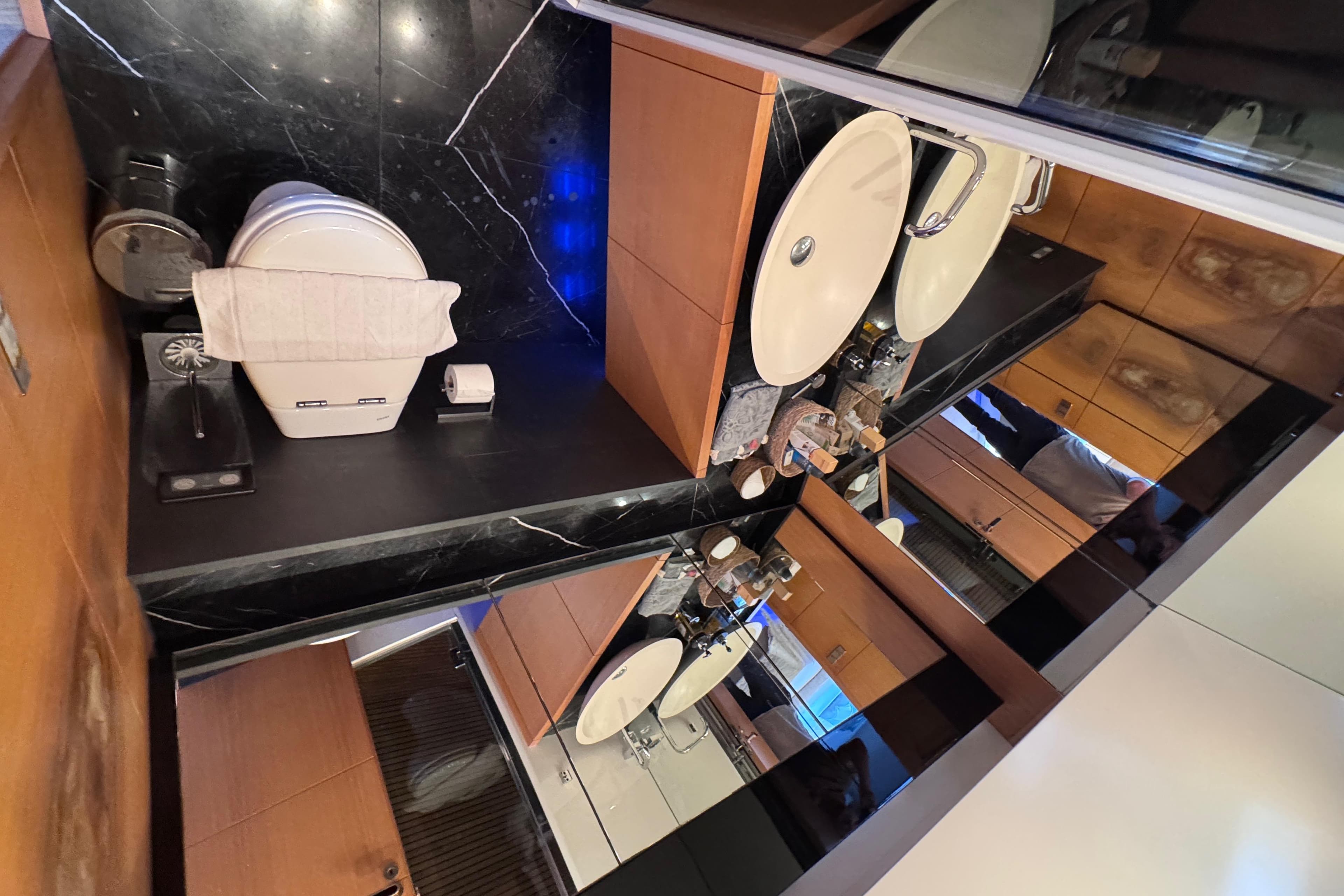 Luxurious bathroom interior on a 2010 Canados 90 yacht, featuring elegant fixtures and modern design.