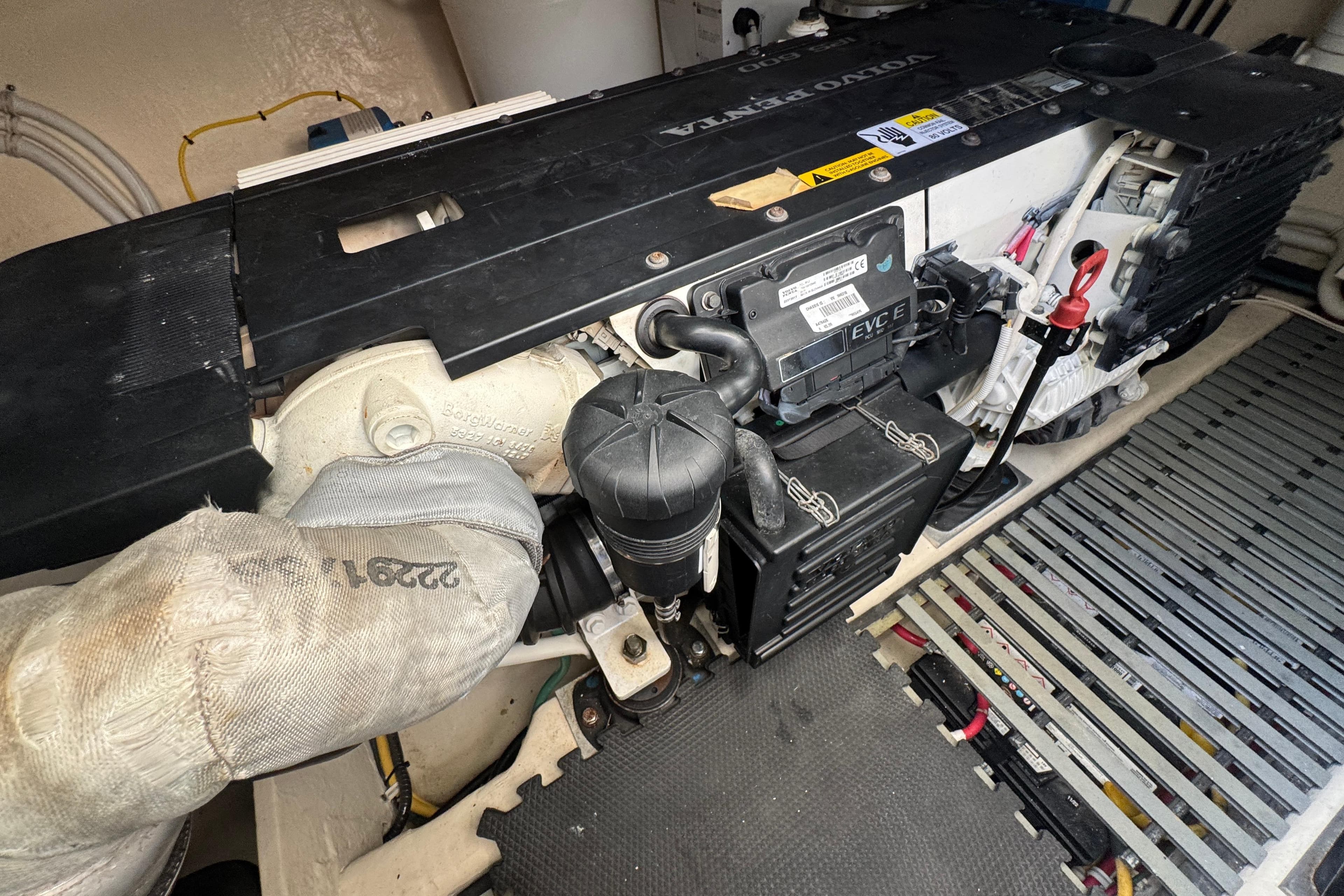 Engine compartment of a 2016 Tiara Yachts C44 Coupe, featuring a Volvo Penta engine.