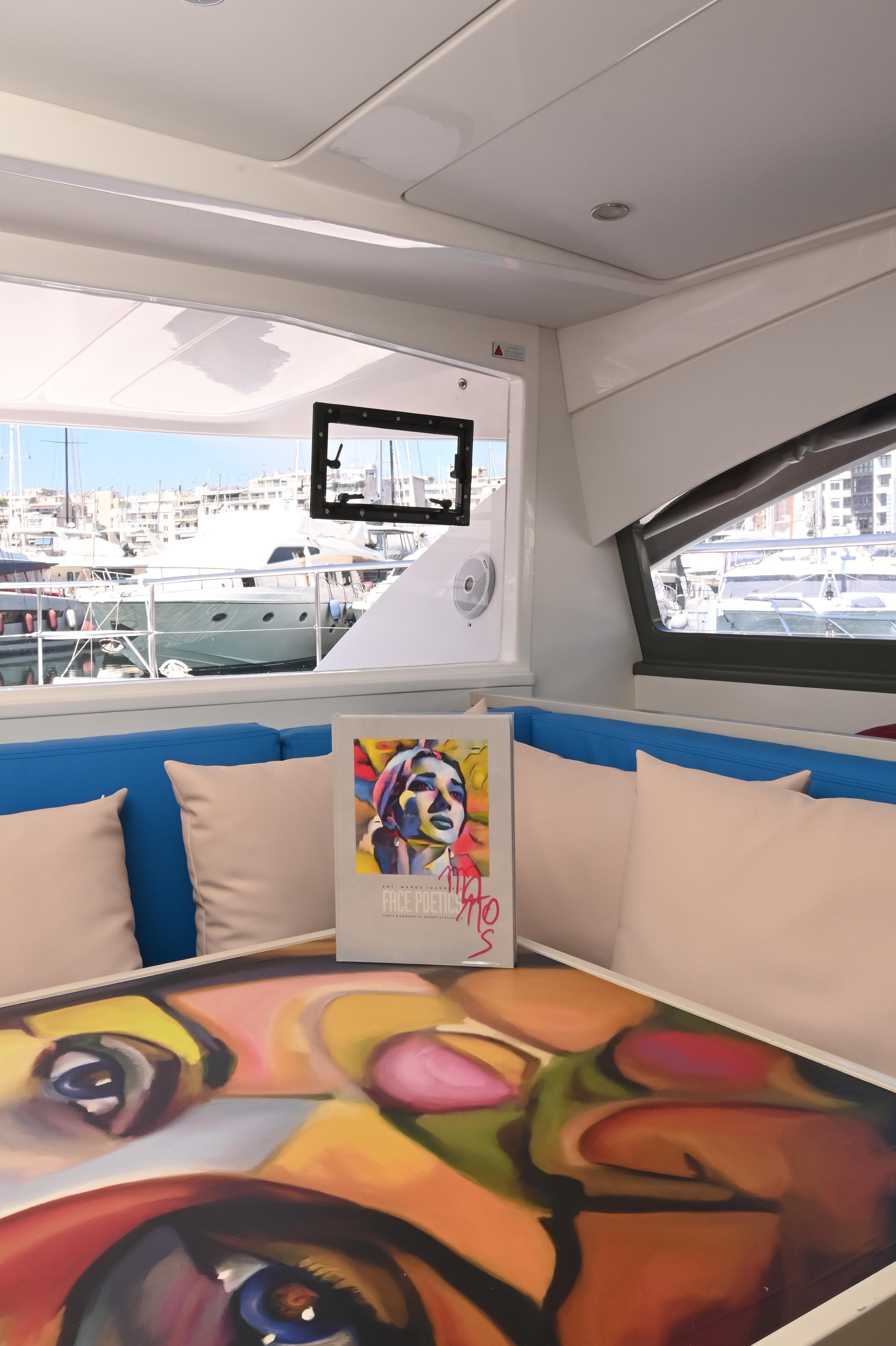 Leopard 51 Powercat 2017 interior with colorful artwork and marina view.