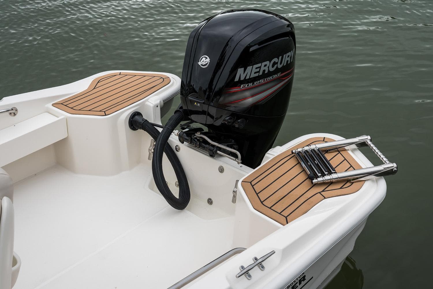 Manufacturer Provided Image: 2026 Boston Whaler 160 Super Sport with Mercury engine, featuring teak deck and swim ladder.