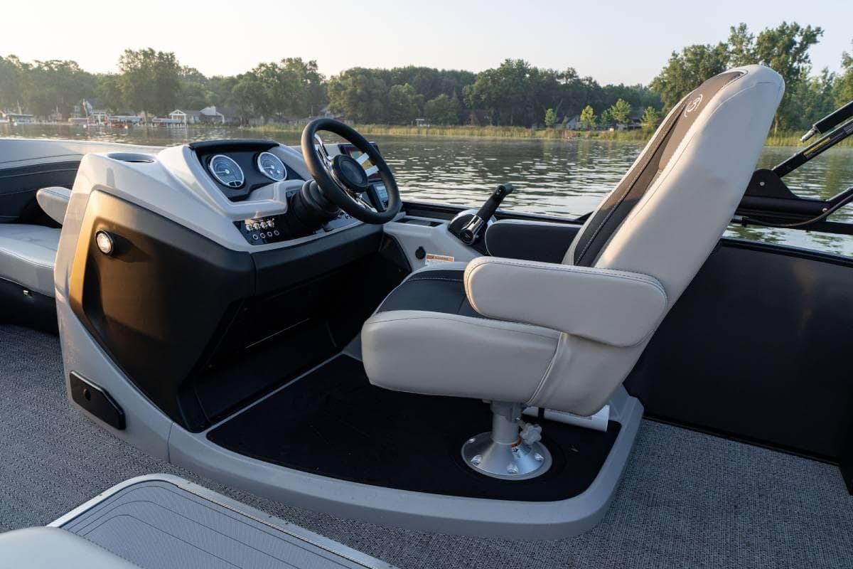 Manufacturer Provided Image: 2026 Barletta Cabrio 22UC boat interior with captain's chair and control panel.