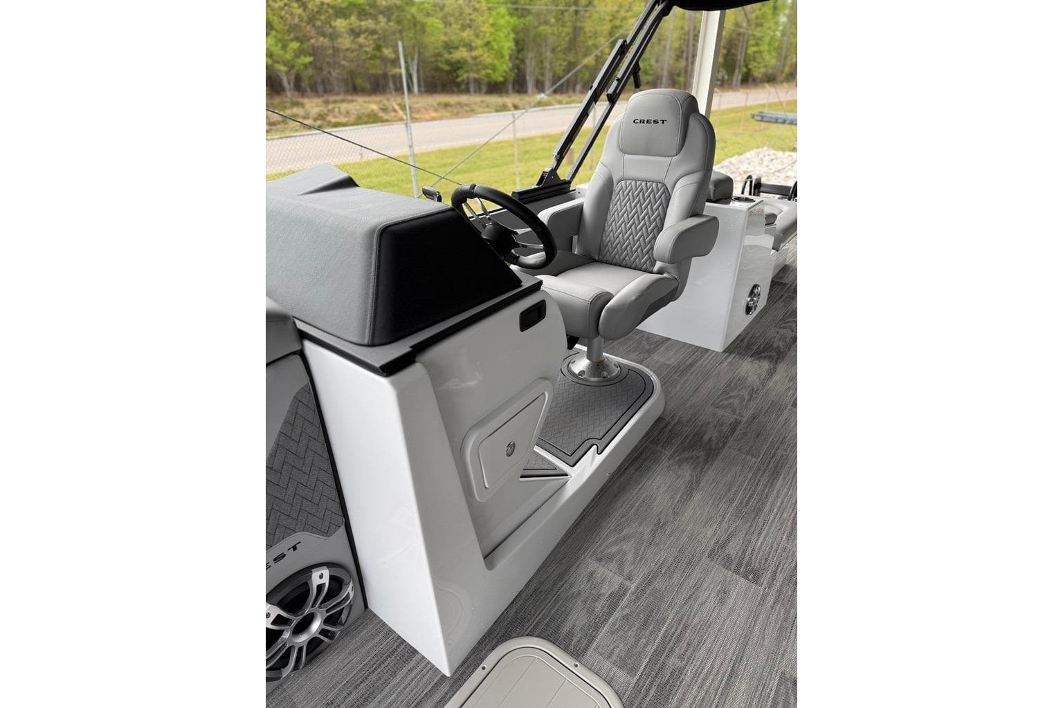 2026 Crest Caribbean 250 SLRC boat interior with modern helm and comfortable seating.