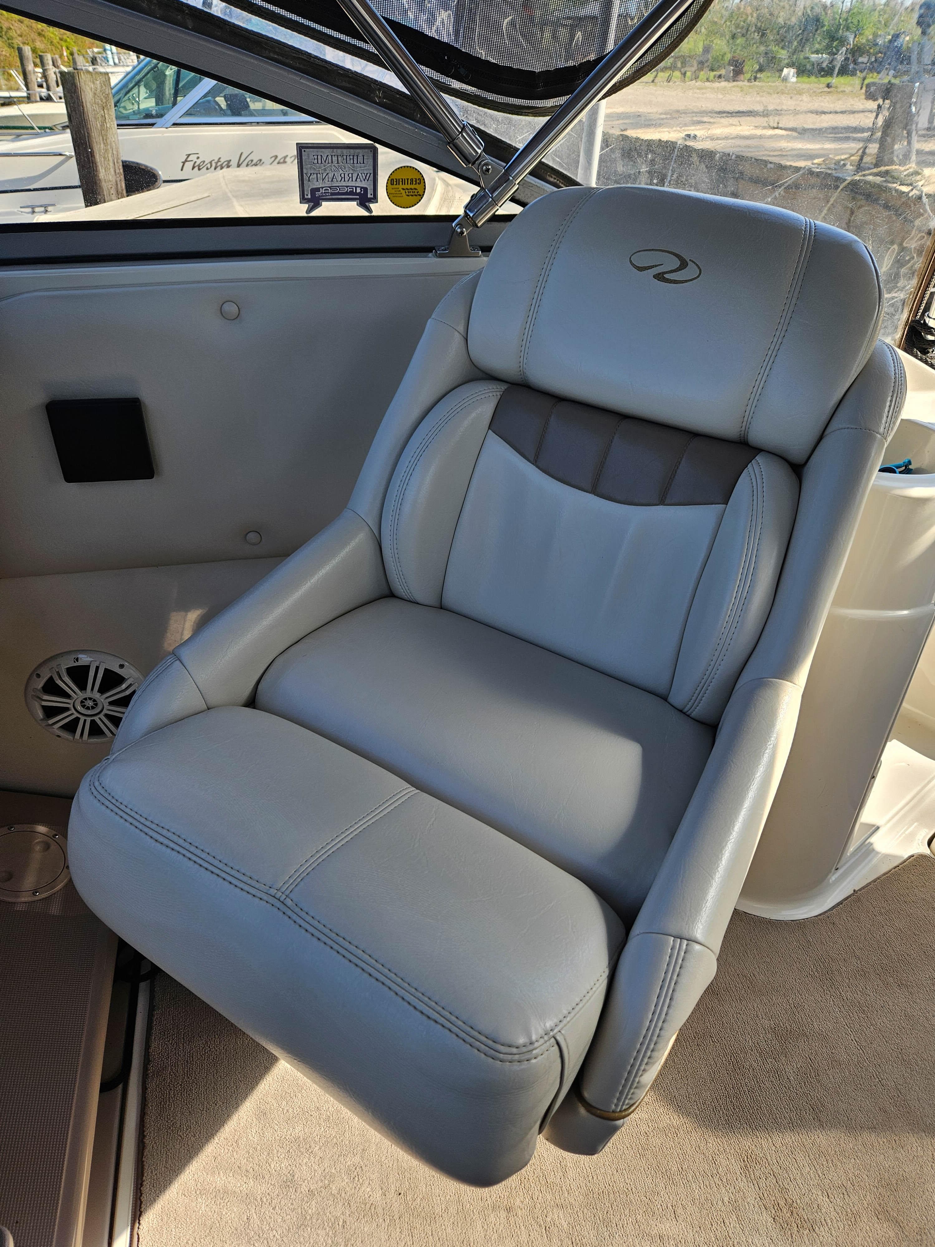 2001 Regal Commodore 2660 boat seat, gray leather, luxurious design, comfortable seating.