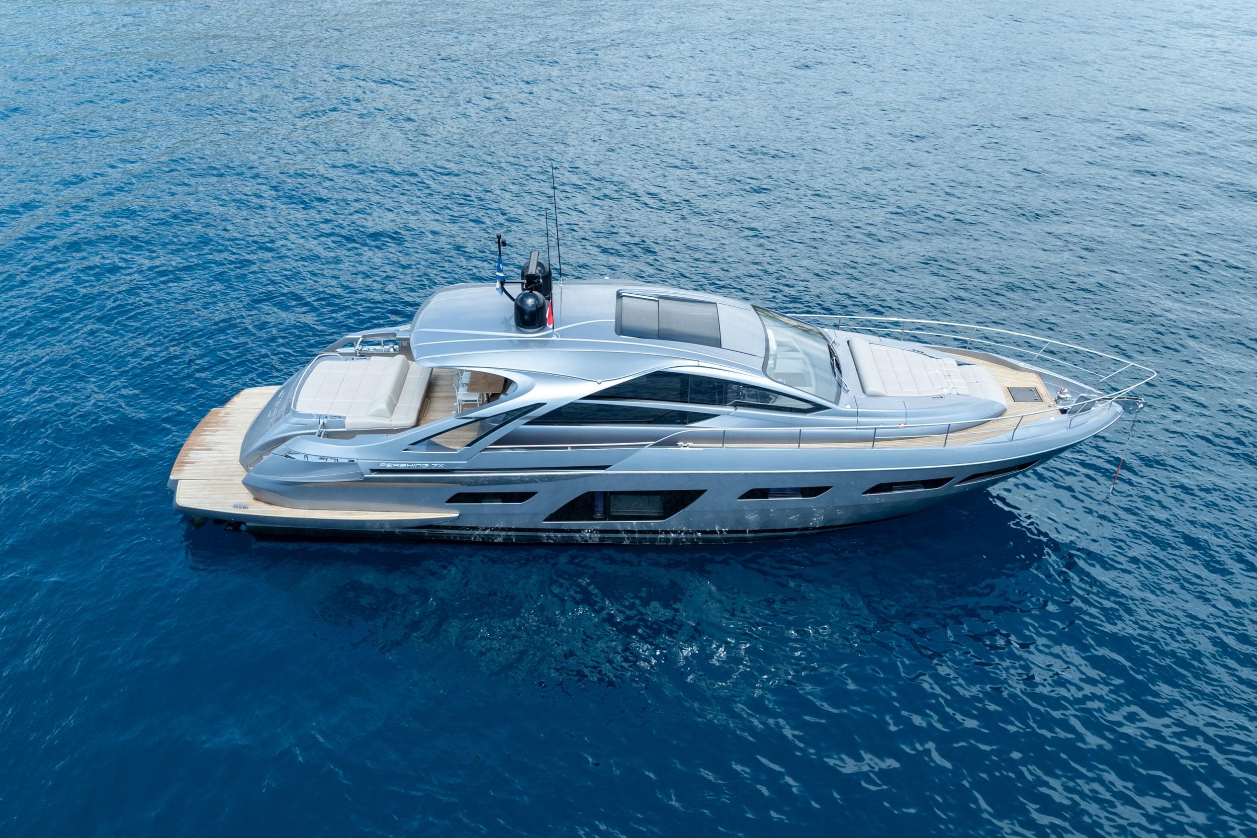 2024 Pershing 7X yacht cruising on open blue sea.