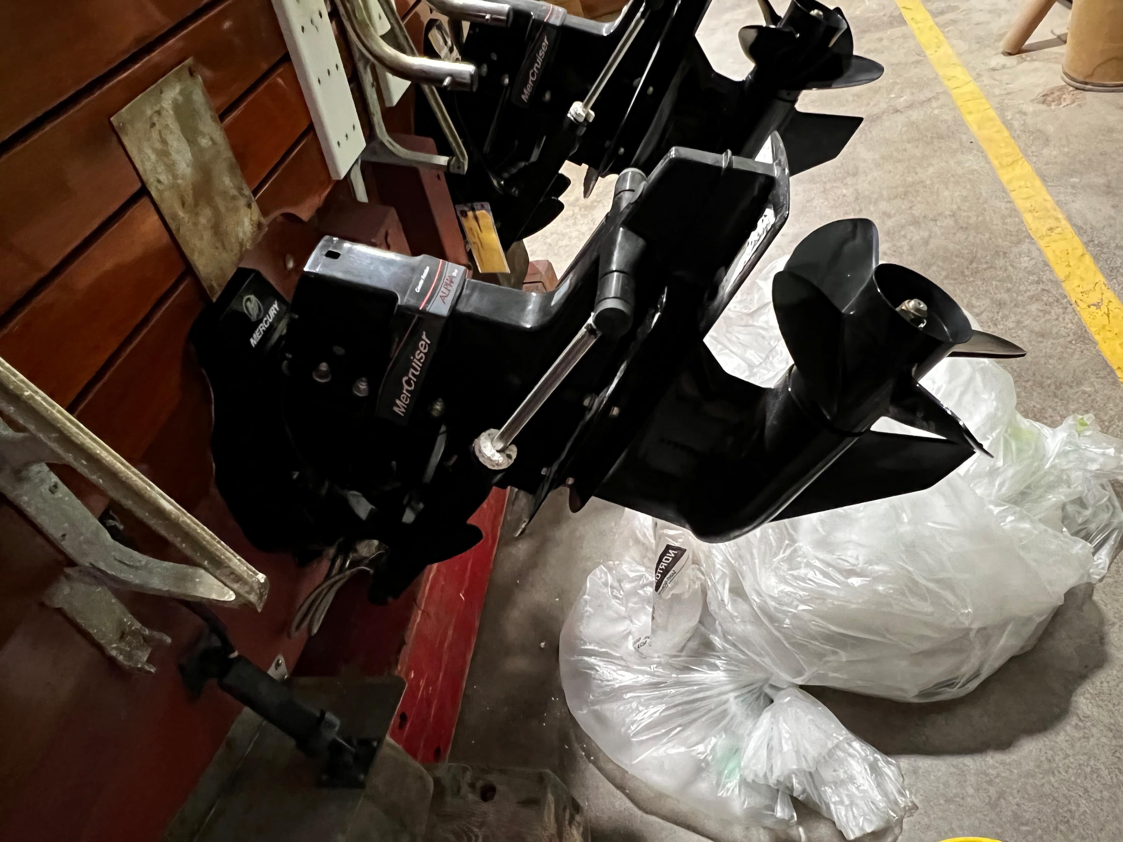 Outboard motor of a 1981 Skiff Craft 260 in a garage setting.