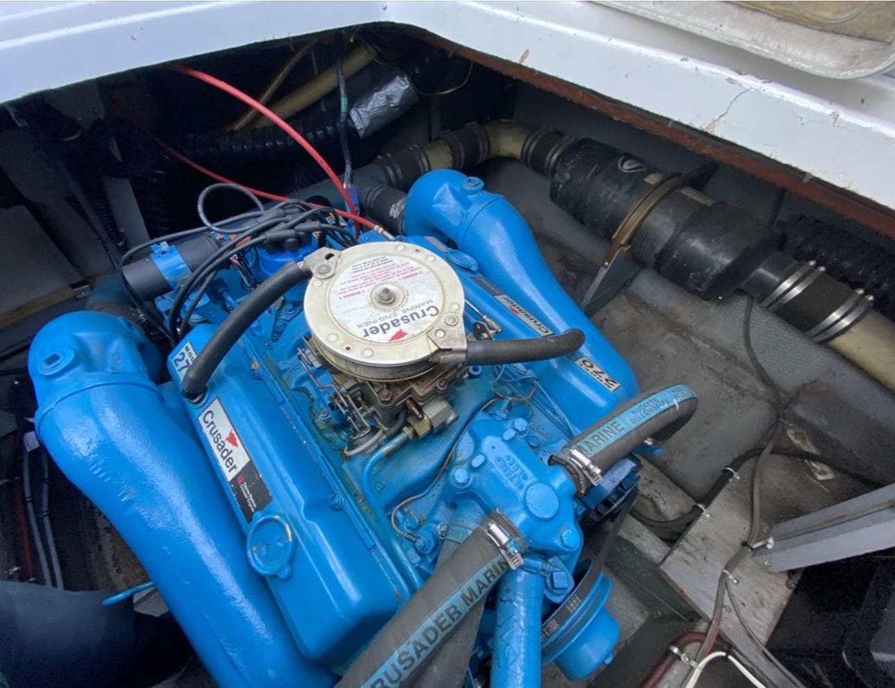 Engine of 1987 Chris-Craft 320 Amerosport boat, featuring Crusader Marine components.
