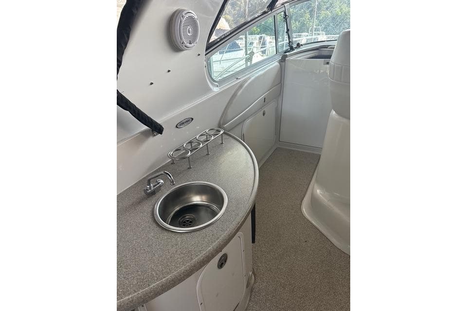 2003 Four Winns 378 Vista boat interior with sink and countertop.