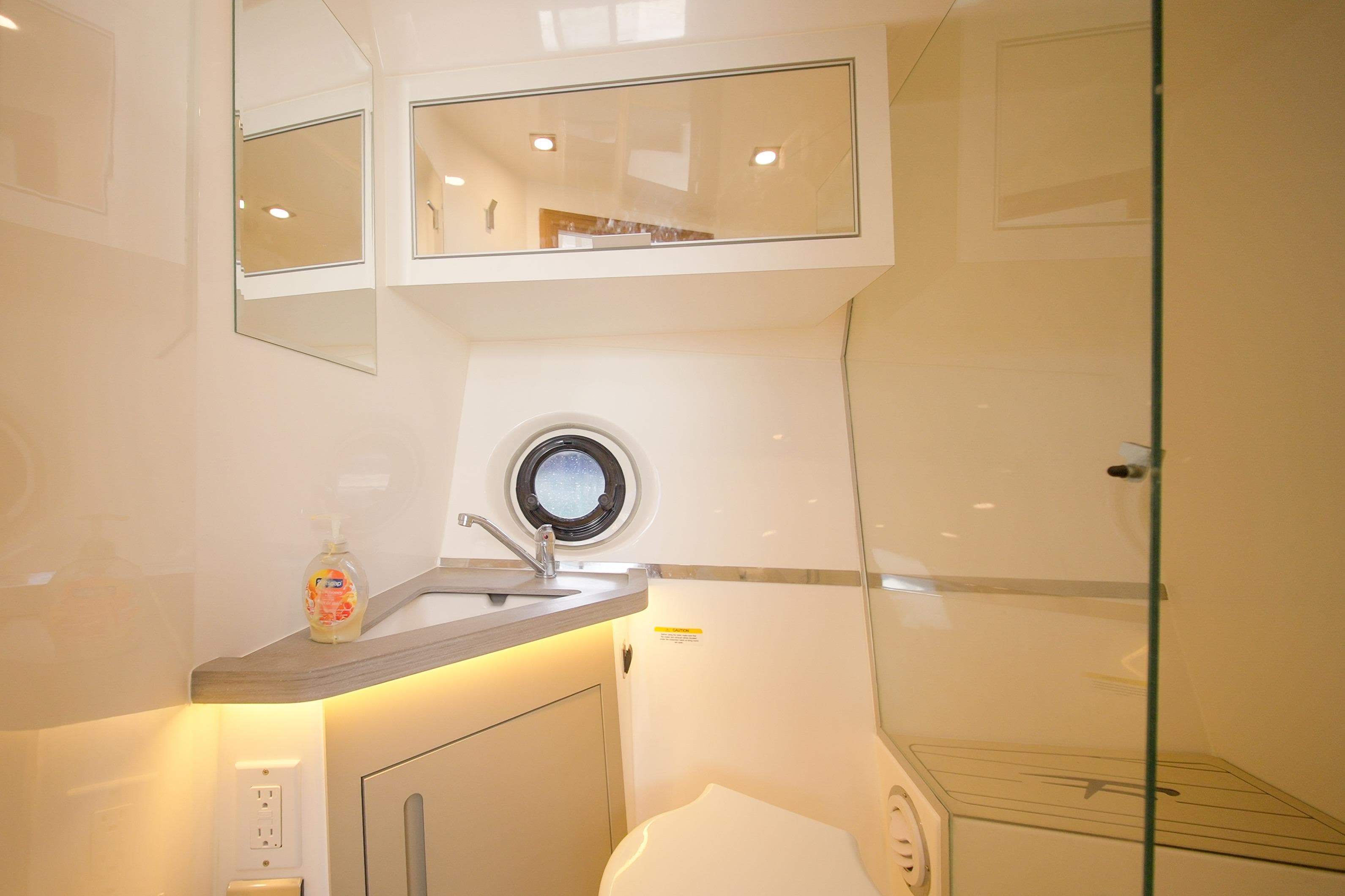 Modern bathroom interior in 2026 Granfort 370 GTX yacht, featuring sleek design and compact amenities.