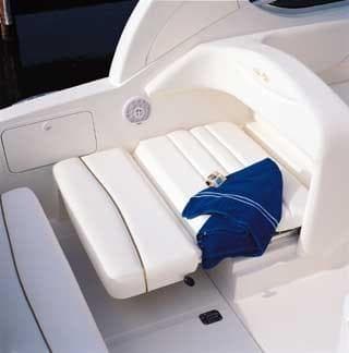 Interior of a 2002 Sea Ray Sundancer 280 with blue blanket.