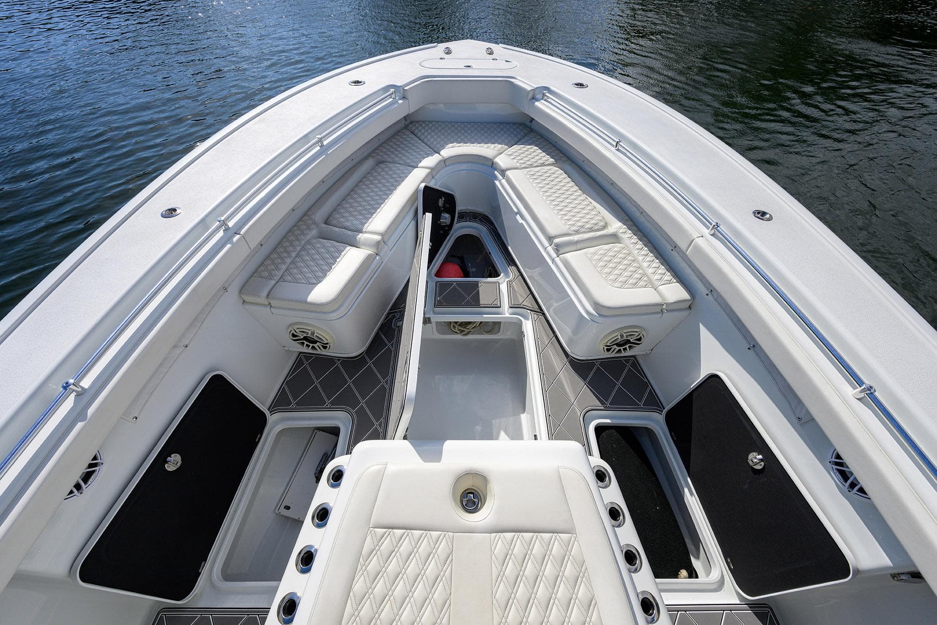2021 Yellowfin 42 boat interior with cushioned seating and storage compartments.