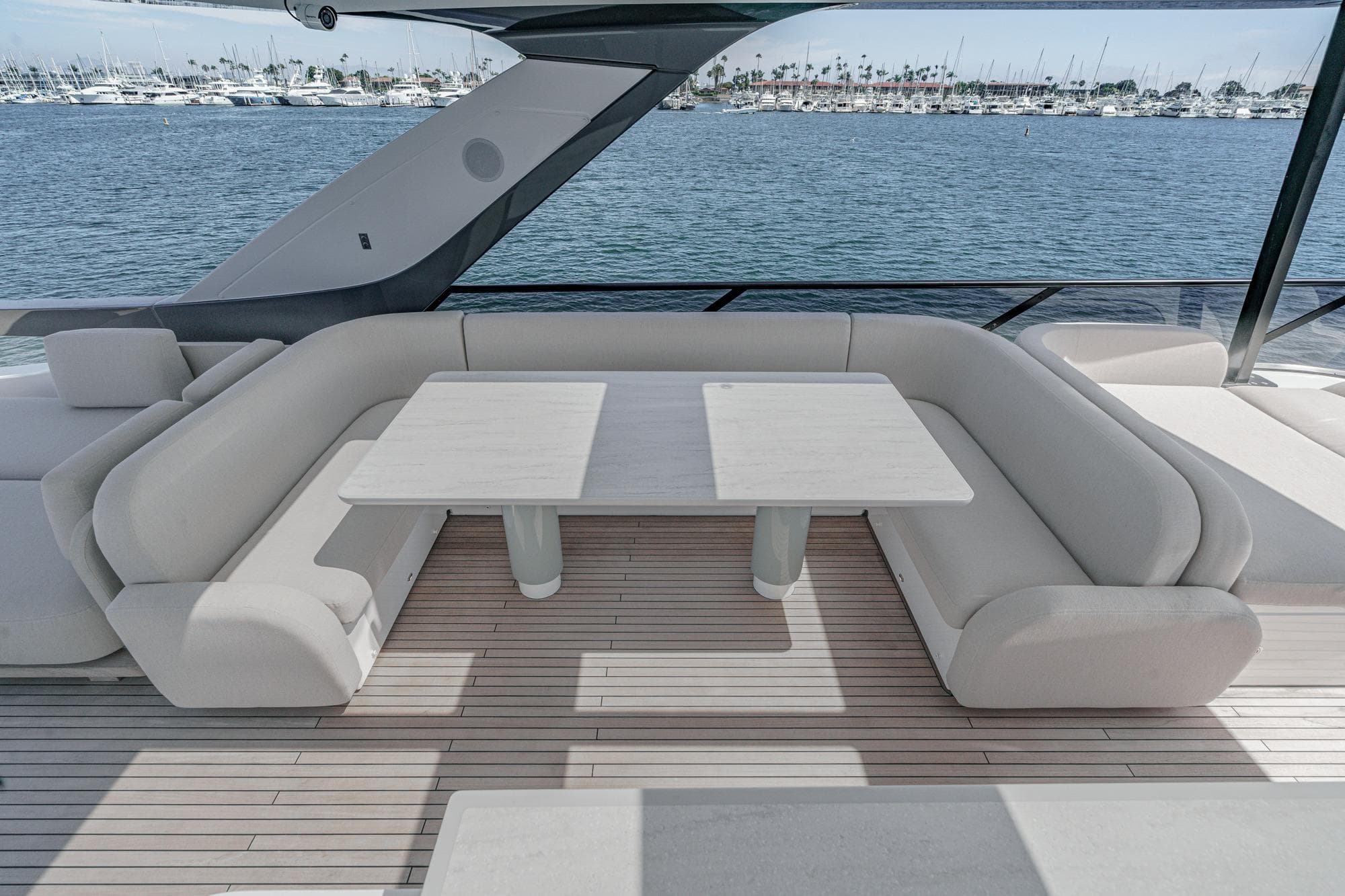 Luxurious seating area on 2026 Azimut Fly 72 yacht with ocean view.
