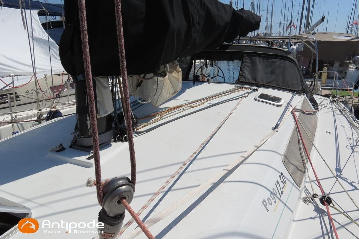 Sailboat Pogo 1250, 2015 model, docked with visible rigging and deck details.