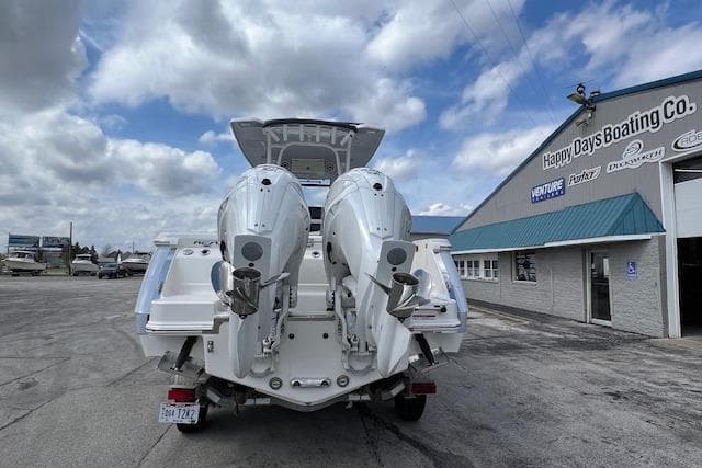 2026 Robalo R270 Center Console boat with dual engines at Happy Days Boating Co. dealership.