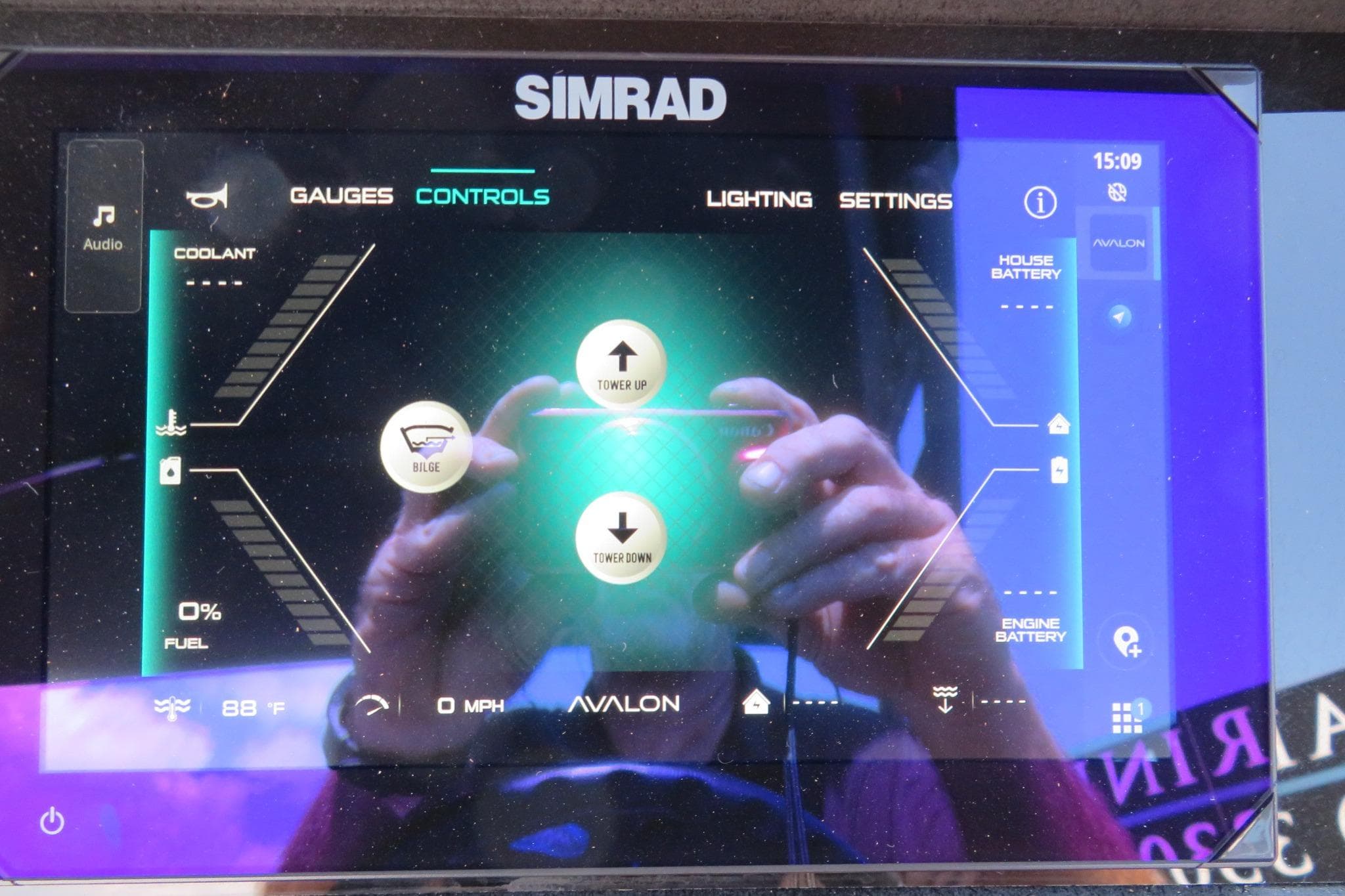 Simrad control panel on Avalon Catalina Quad Lounge Shift 2026, displaying gauges and settings.