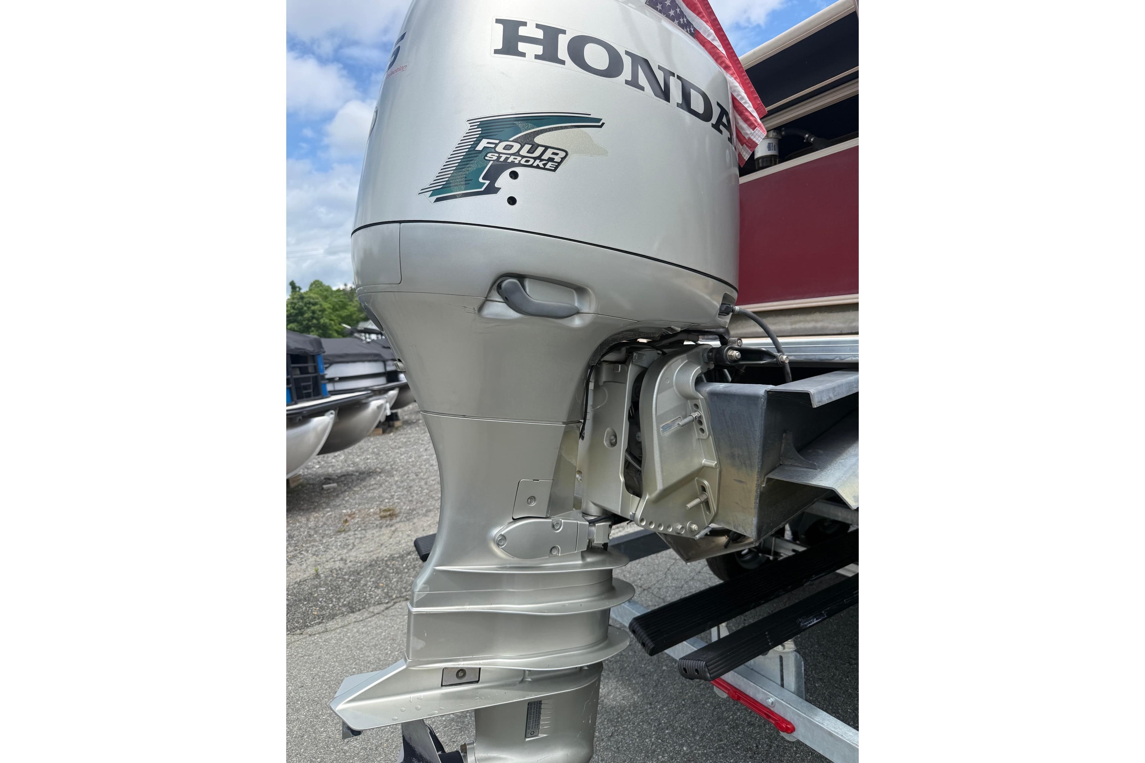 Honda four-stroke outboard motor on 2008 Sylvan 8523 Mandalay RE boat.