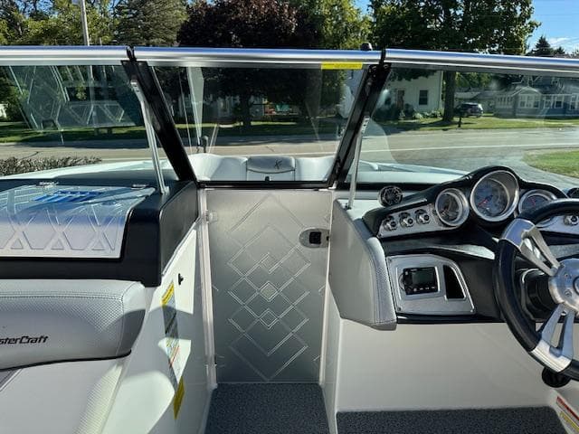 2016 MasterCraft X46 boat interior with modern dashboard and steering wheel.
