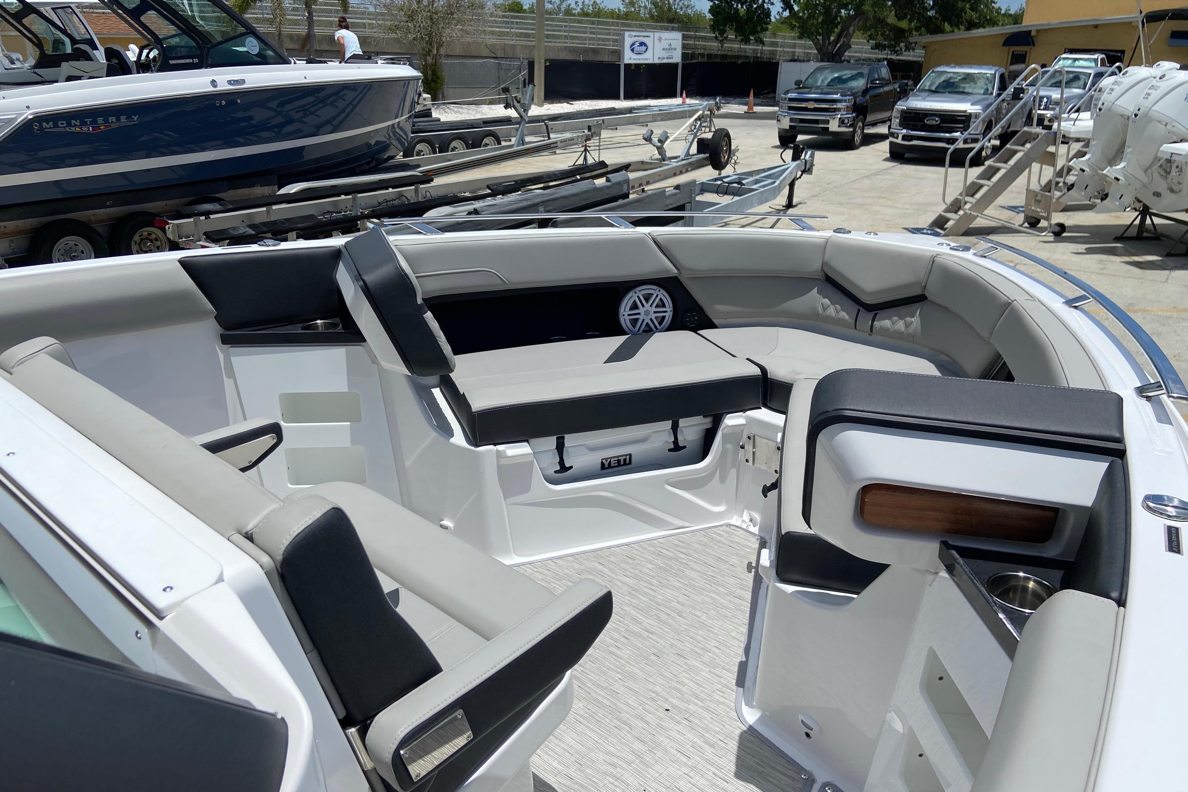 2026 Monterey Elite 30 OB boat interior with luxurious seating and modern amenities.