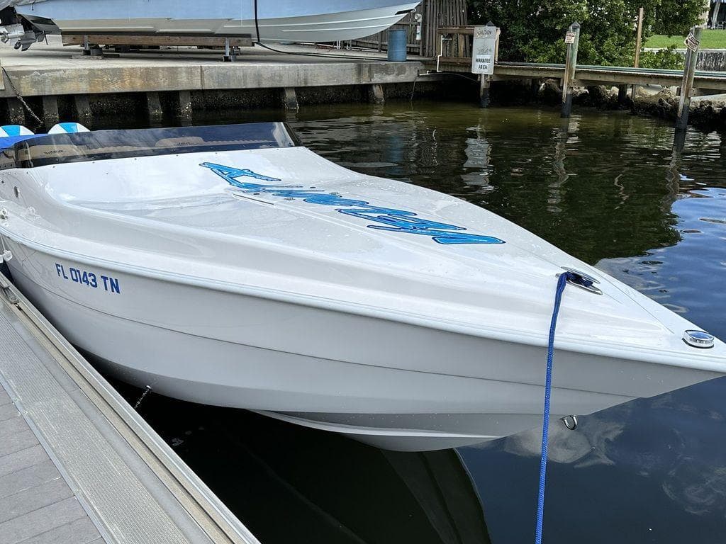 2024 Velocity 290sc speedboat docked in marina.