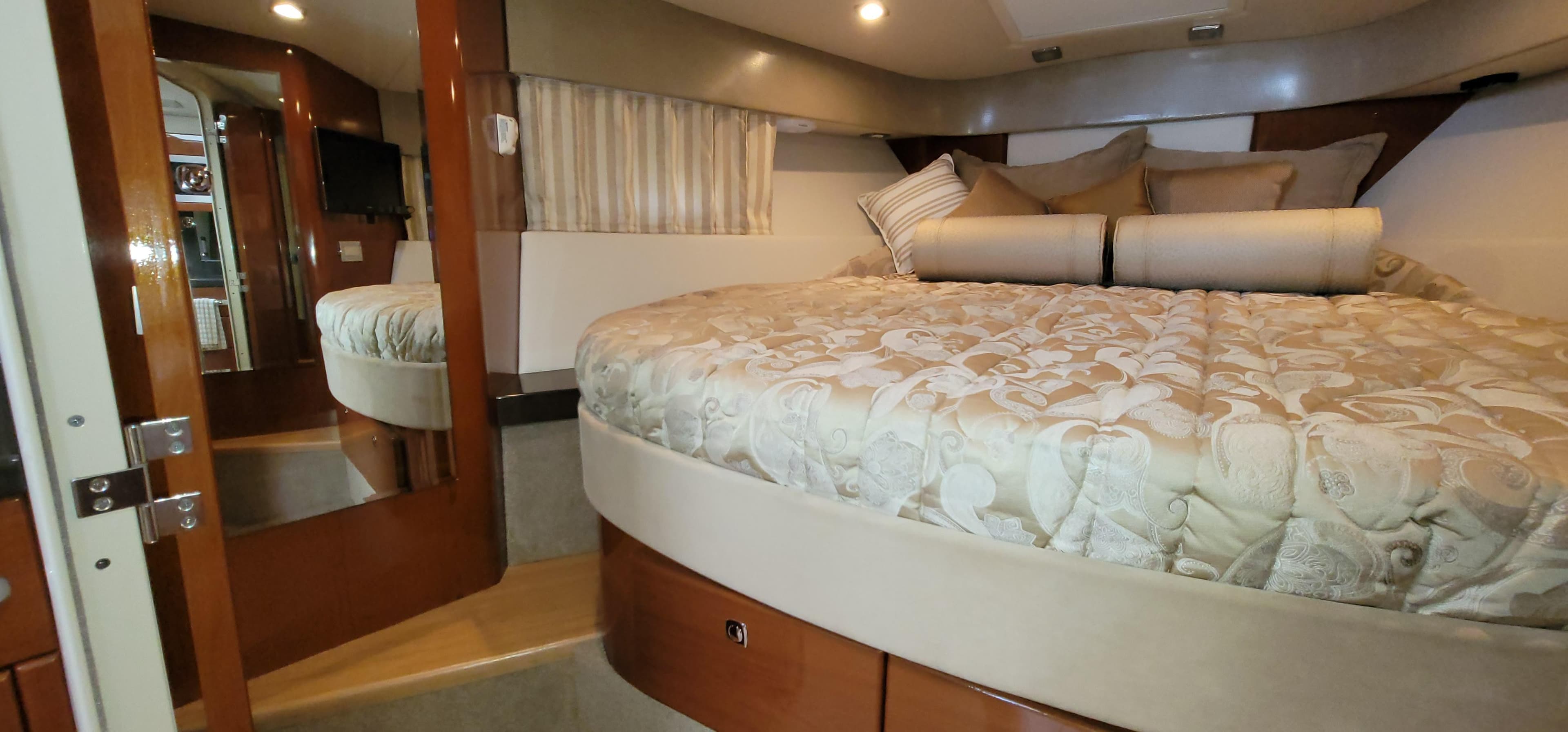Interior of a 2012 Formula 37 Performance Cruiser with luxurious bed.