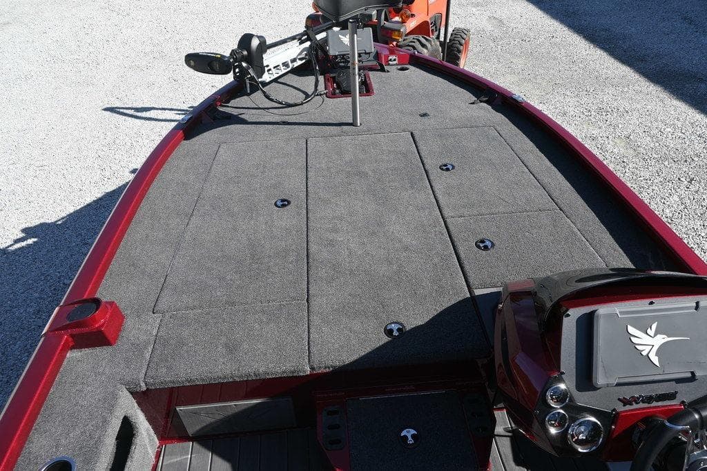 2026 Vexus AVX 2100 boat deck with gray carpet and red trim.