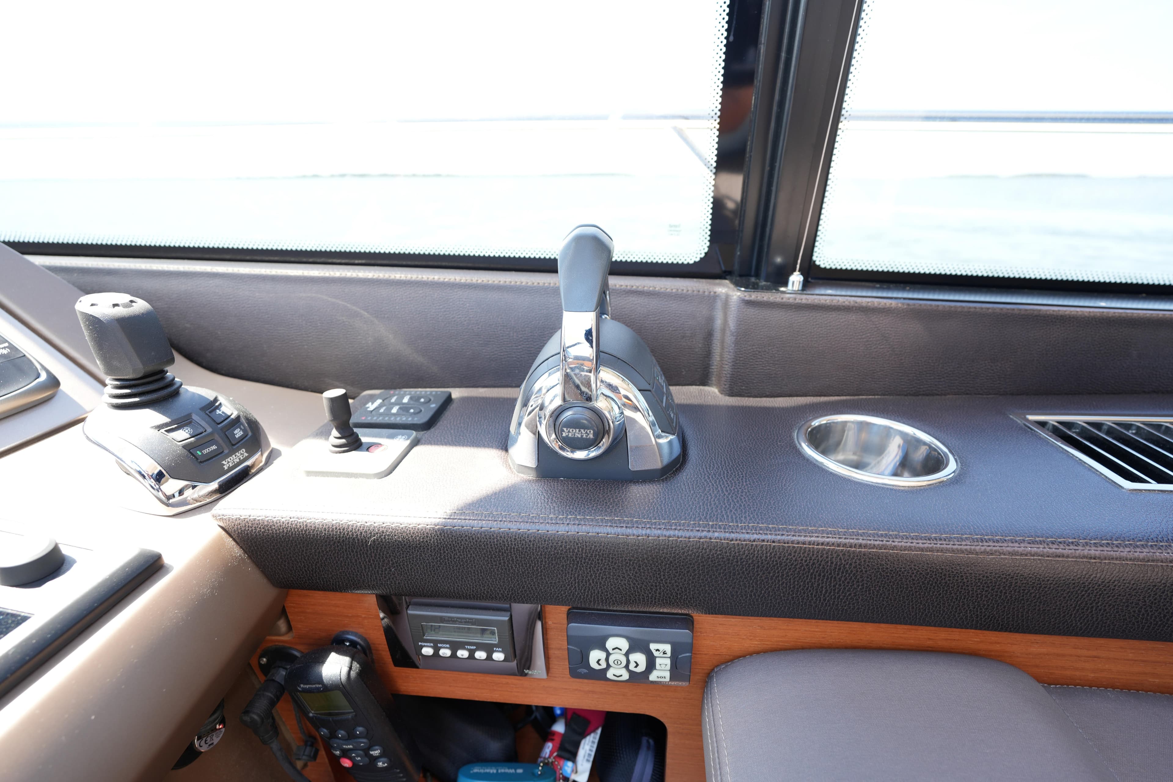 Control panel of a 2015 Prestige 500S yacht with joystick and throttle.