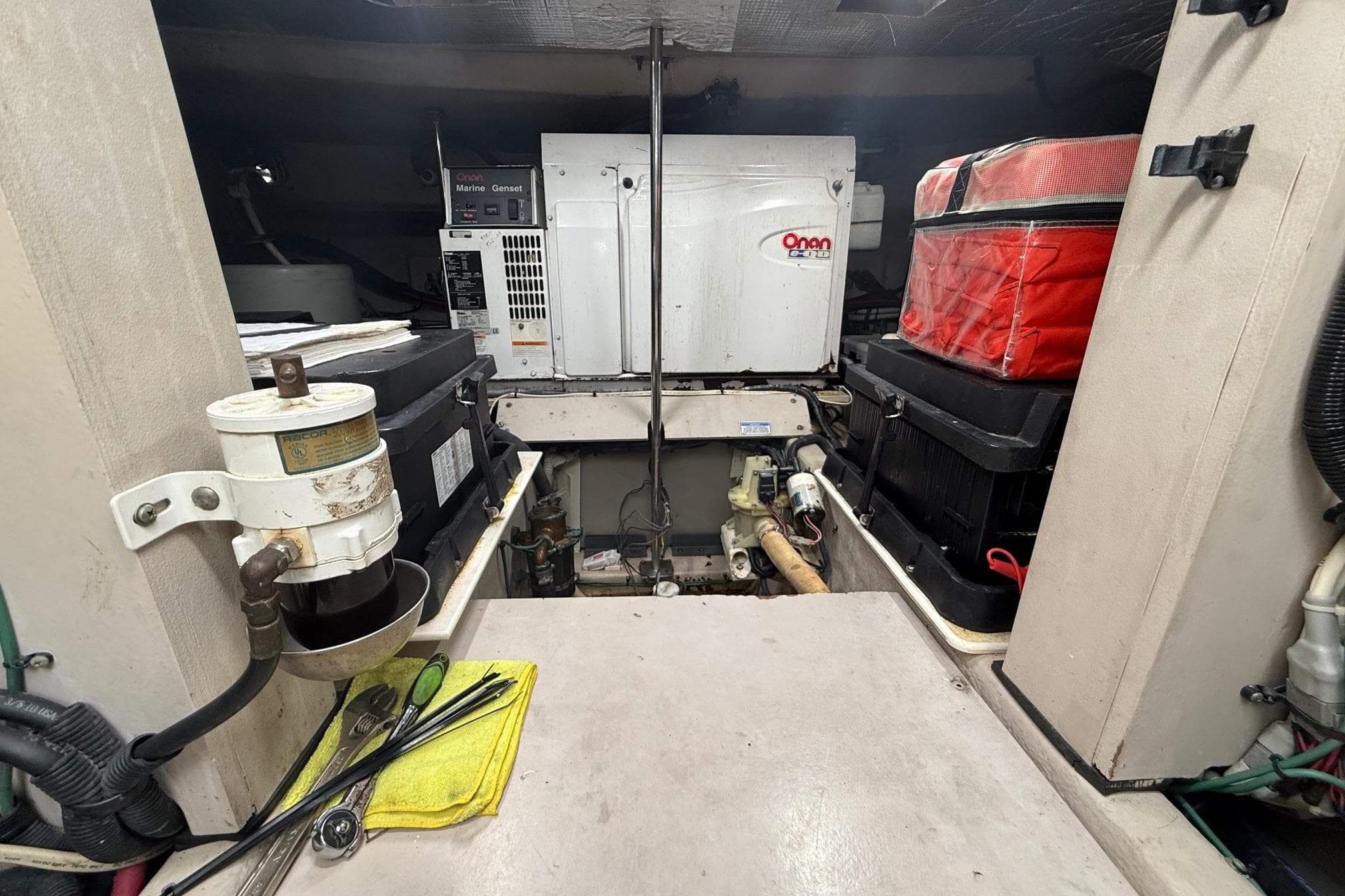 Engine room of a 2004 Sea Ray 550 Sundancer with Onan marine generator.