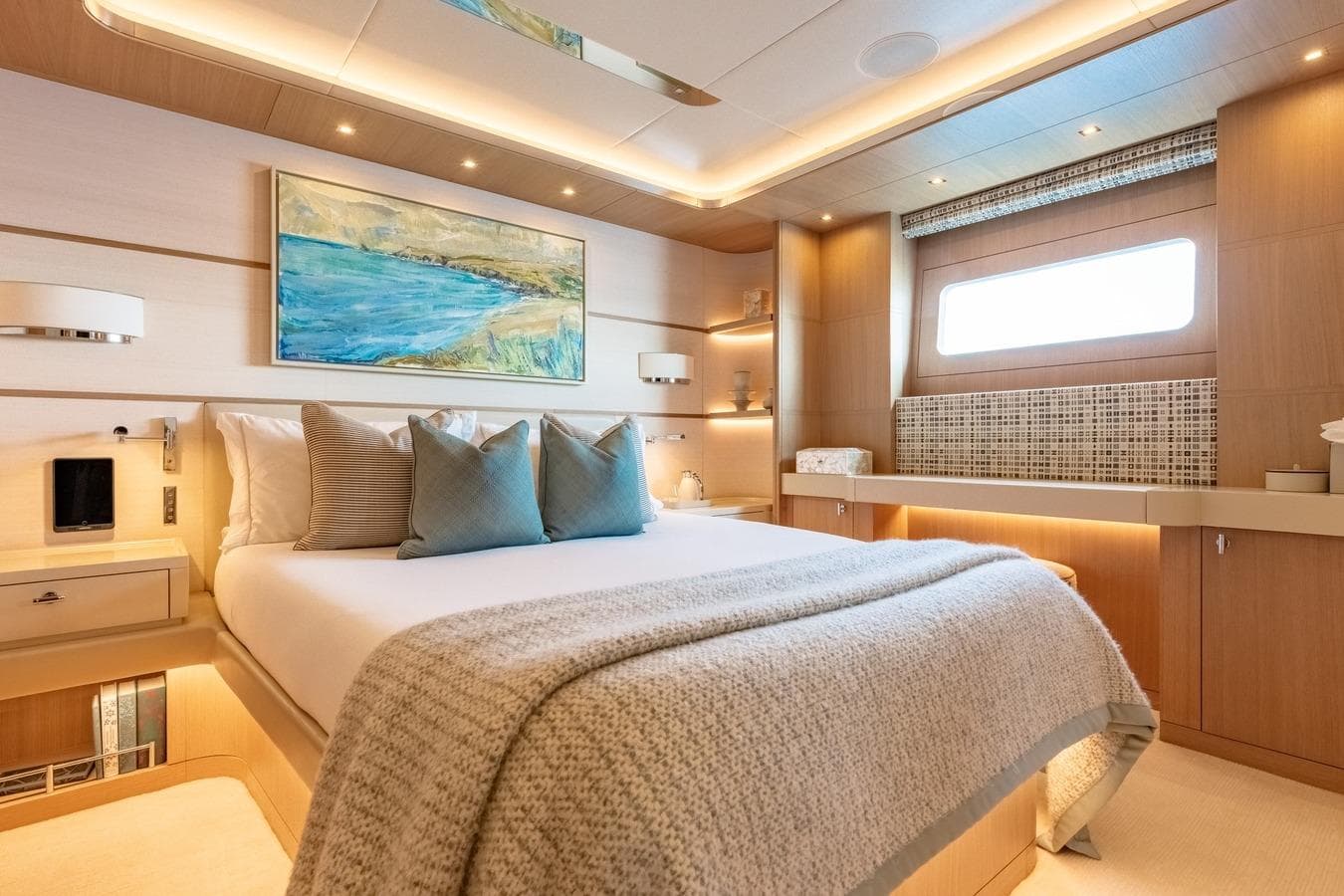 Luxurious bedroom interior of 2020 Moonen Martinique YN1 yacht with modern decor.
