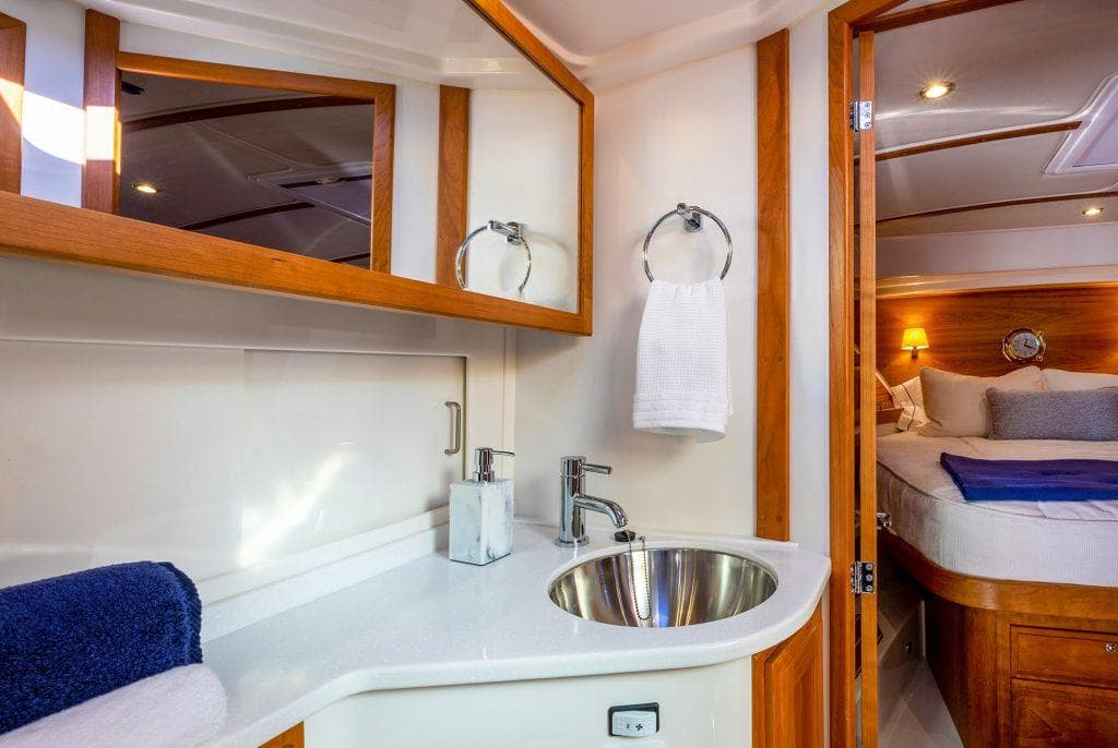 Luxurious bathroom and bedroom interior of 2026 Back Cove 372 yacht.