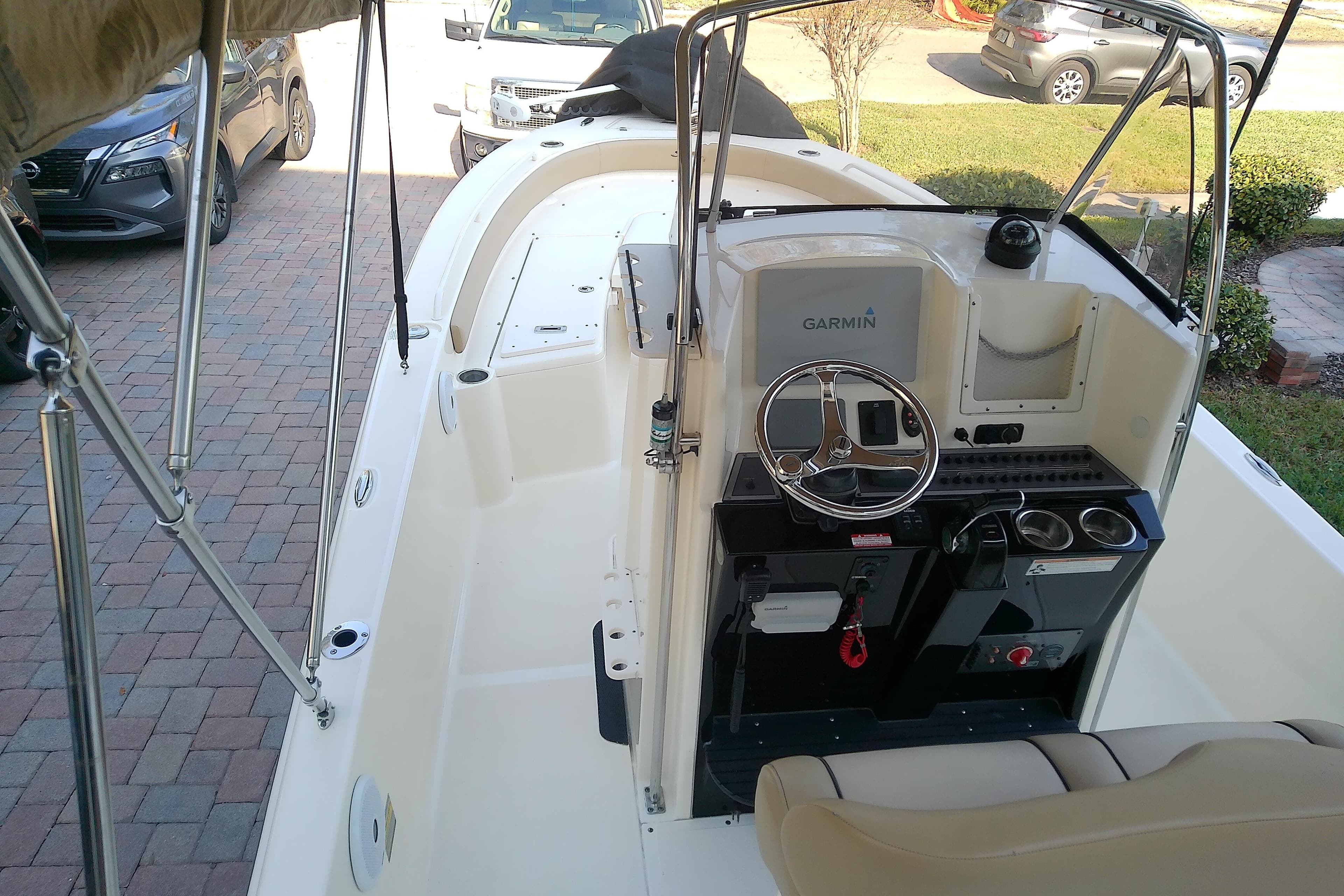 2018 Scout 251 XSS boat interior with Garmin navigation system and steering wheel.