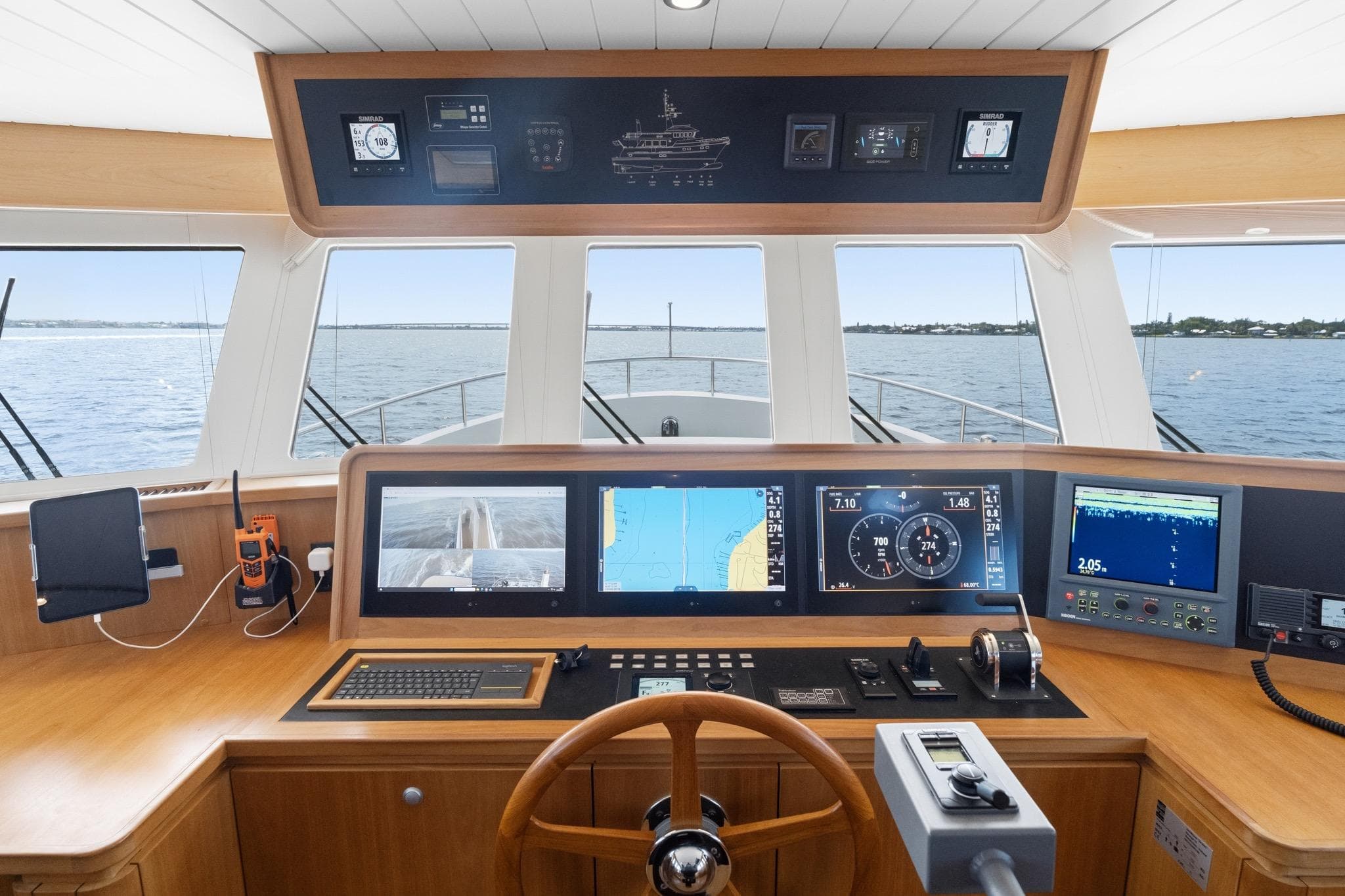 Bridge of 2022 Alm Trawler Delfino 64 with advanced navigation systems.