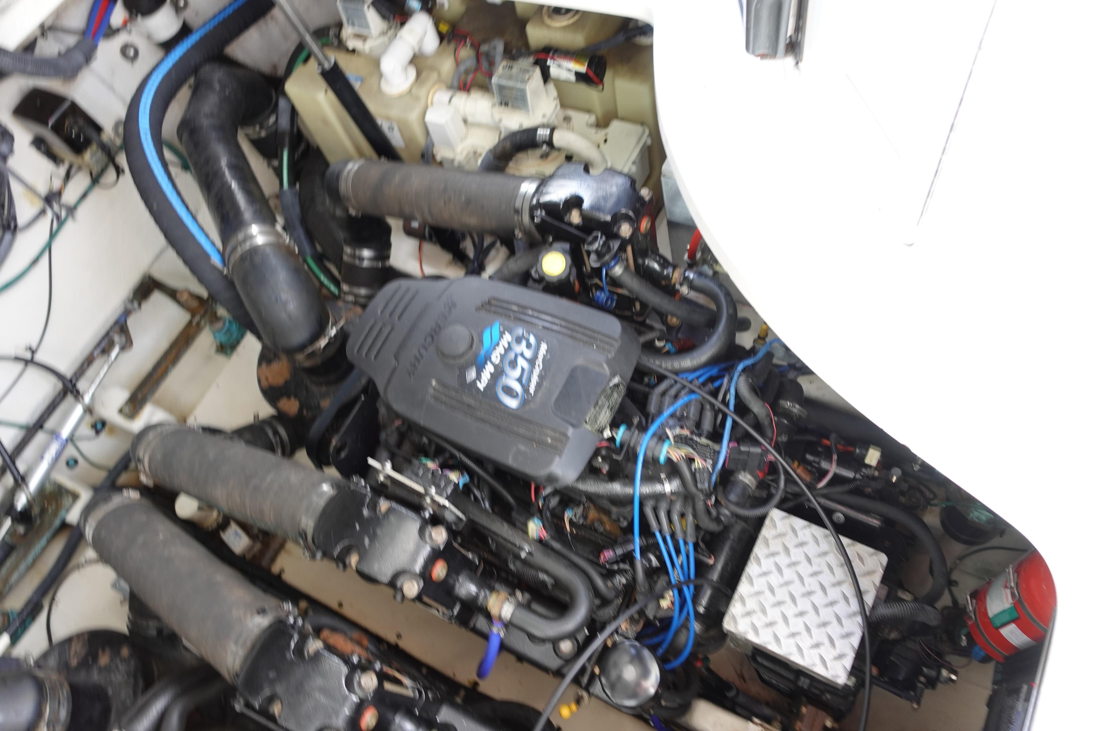 Engine compartment of a 2007 Sea Ray 320 Sundancer boat, featuring a Mercury 350 engine.