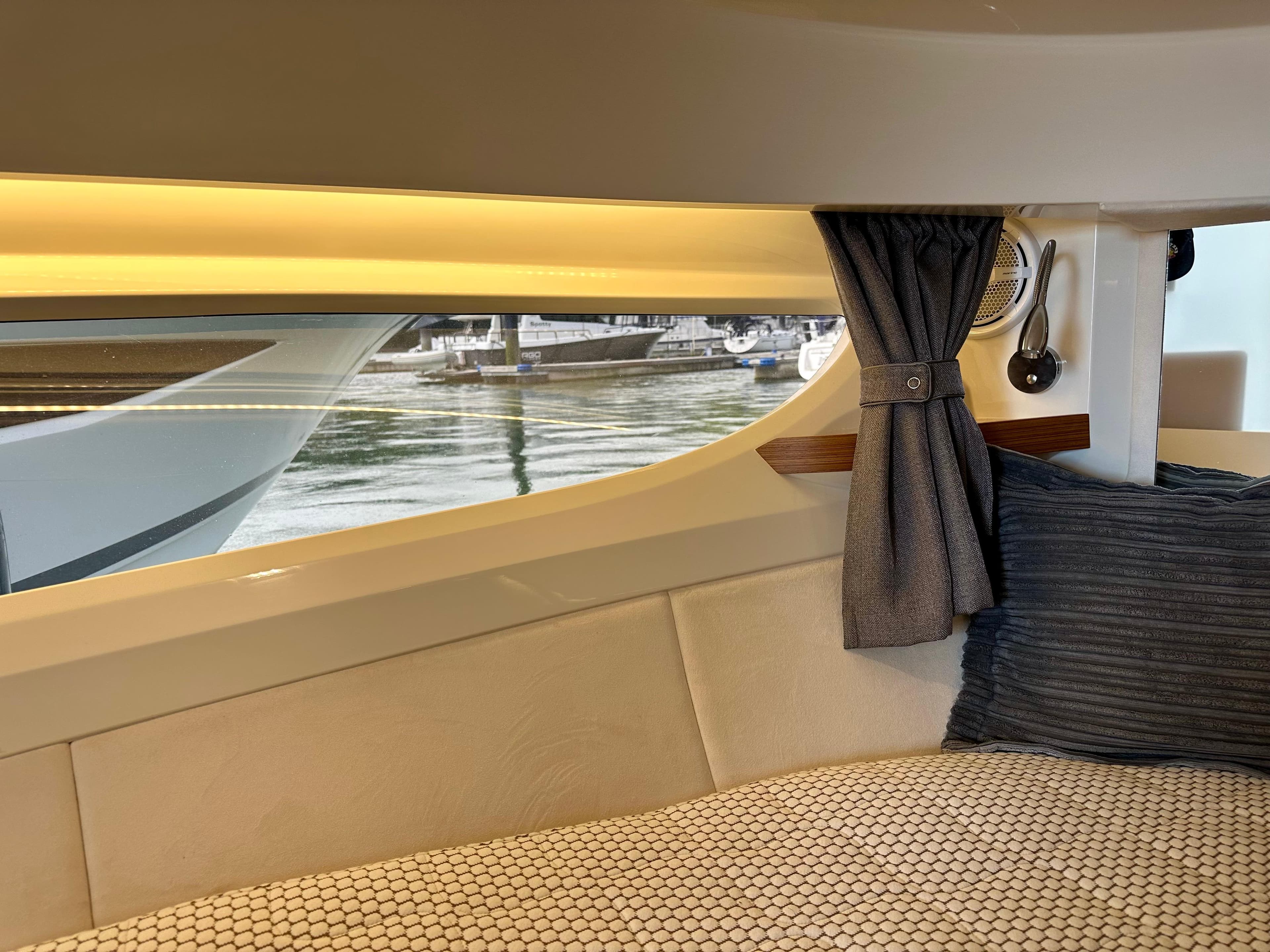 Interior of 2021 Marex 310 Sun Cruiser with window view.