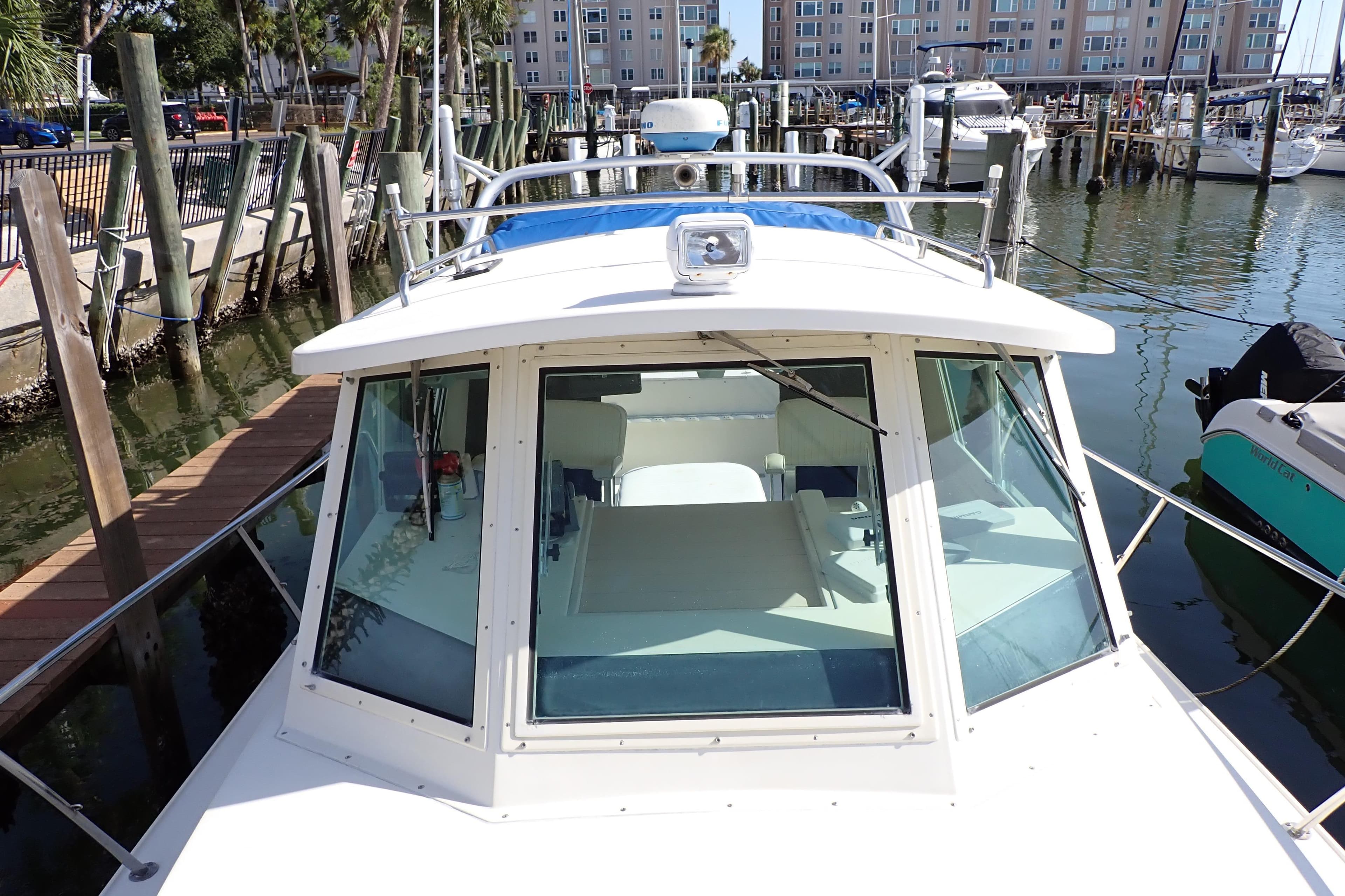 2000 Albin 28 Tournament Express docked at marina, front view.