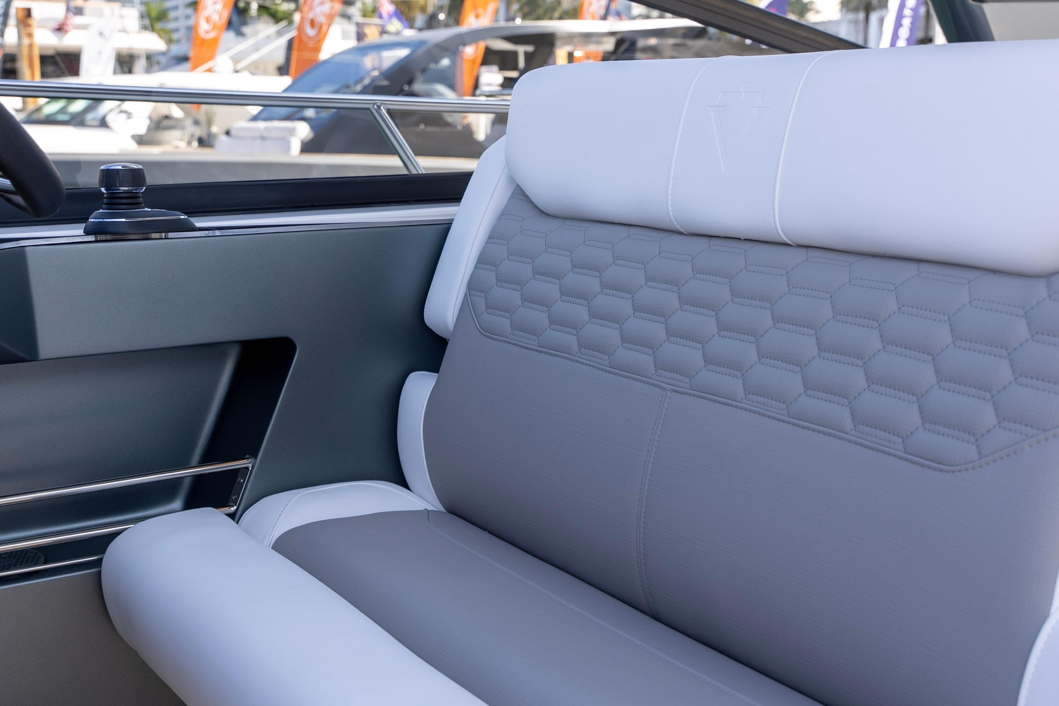 Luxurious interior seating of 2026 Valiatt 350GT with hexagonal pattern design.