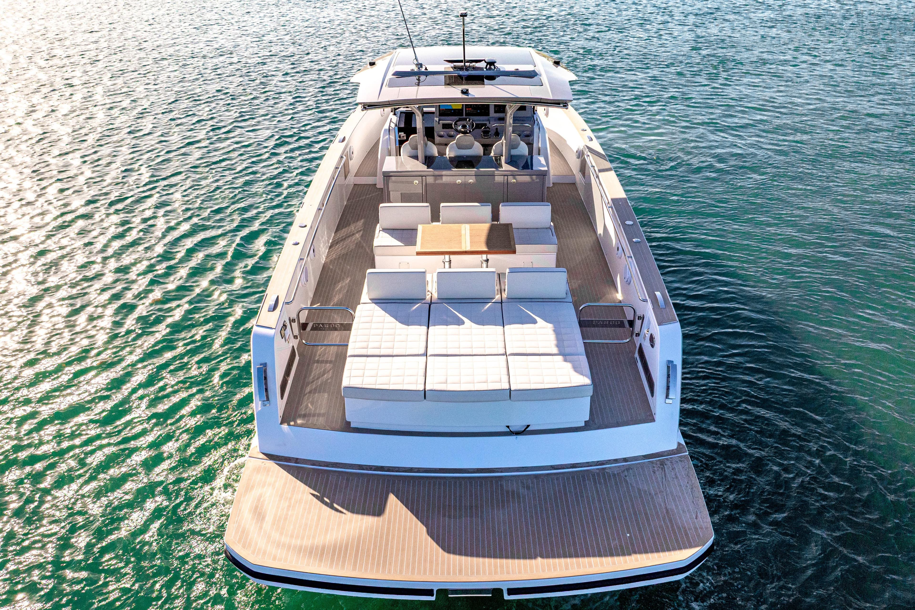 2024 Pardo Yachts P43 luxury yacht on serene water, showcasing spacious deck design.