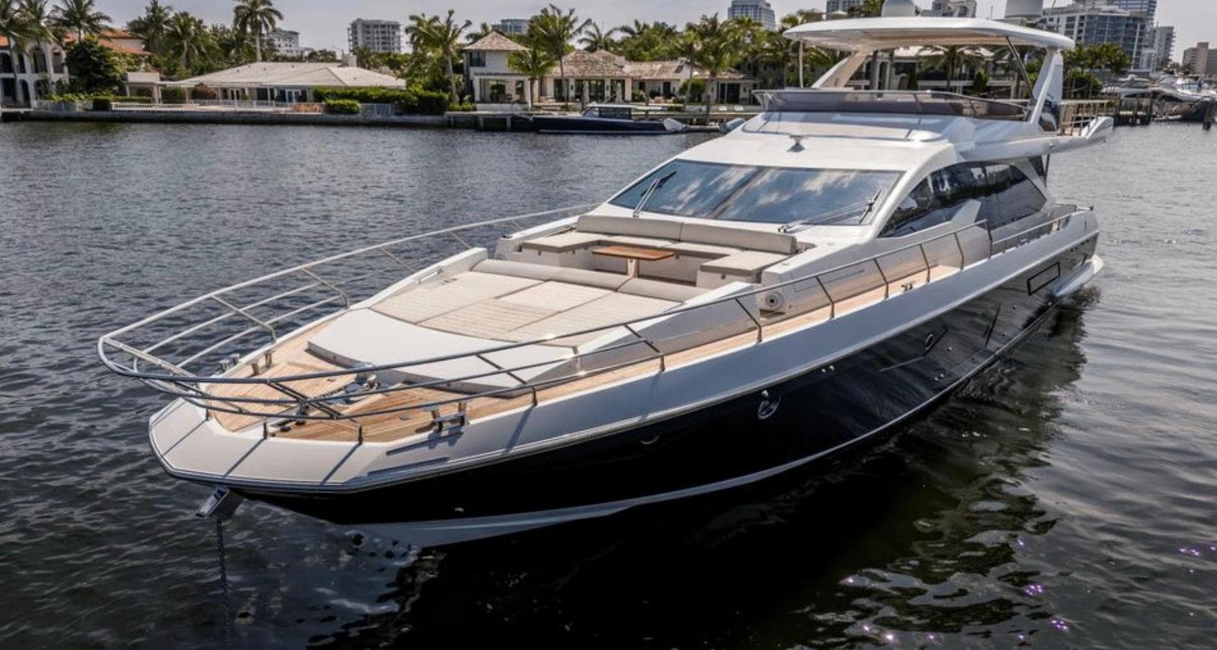 Azimut Fly 72 yacht, 2016 model, cruising on a serene waterway with luxury features.